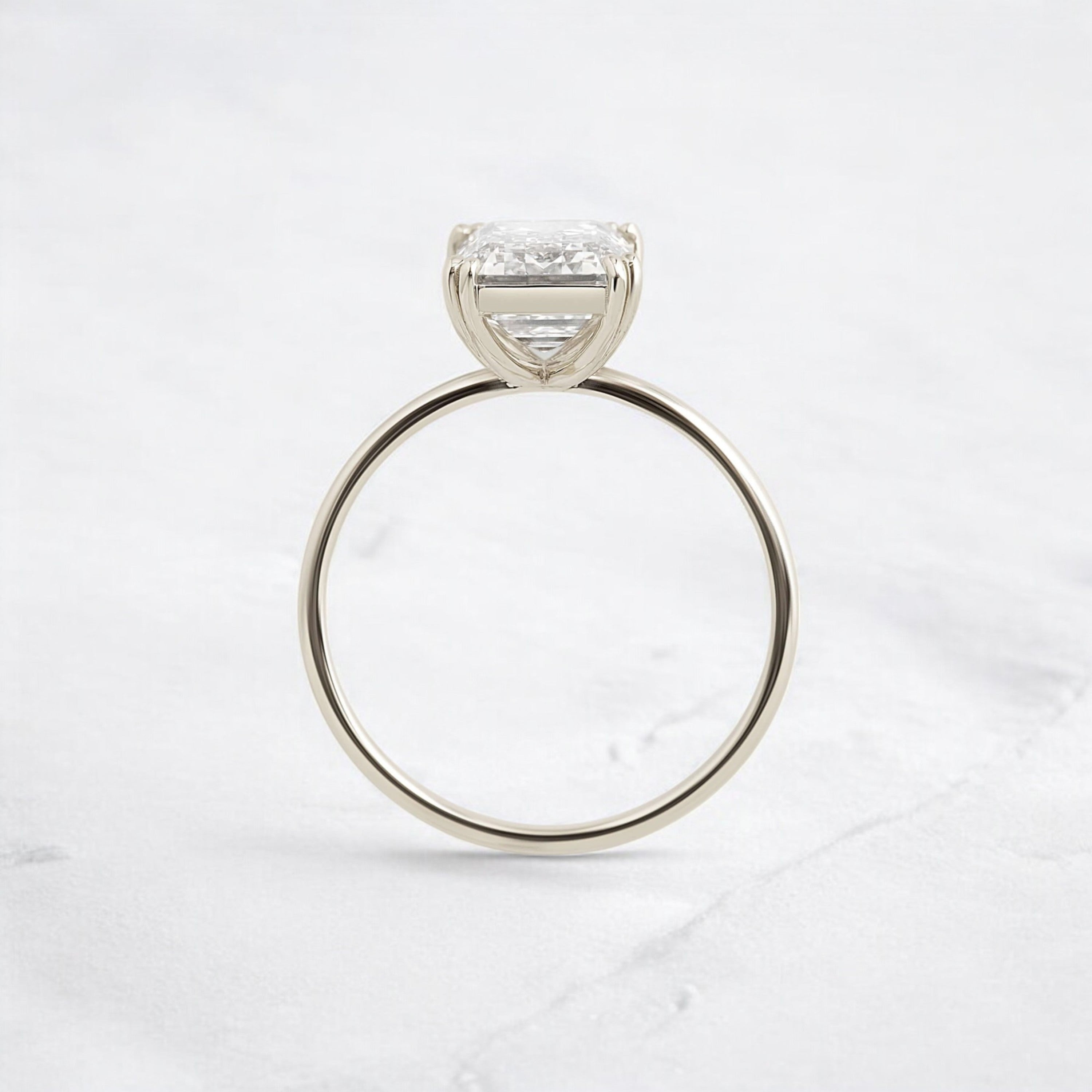 handmade-double-prong-emerald-solitaire-moissanite-engagement-ring-3-05-ct-white-gold-gemfora