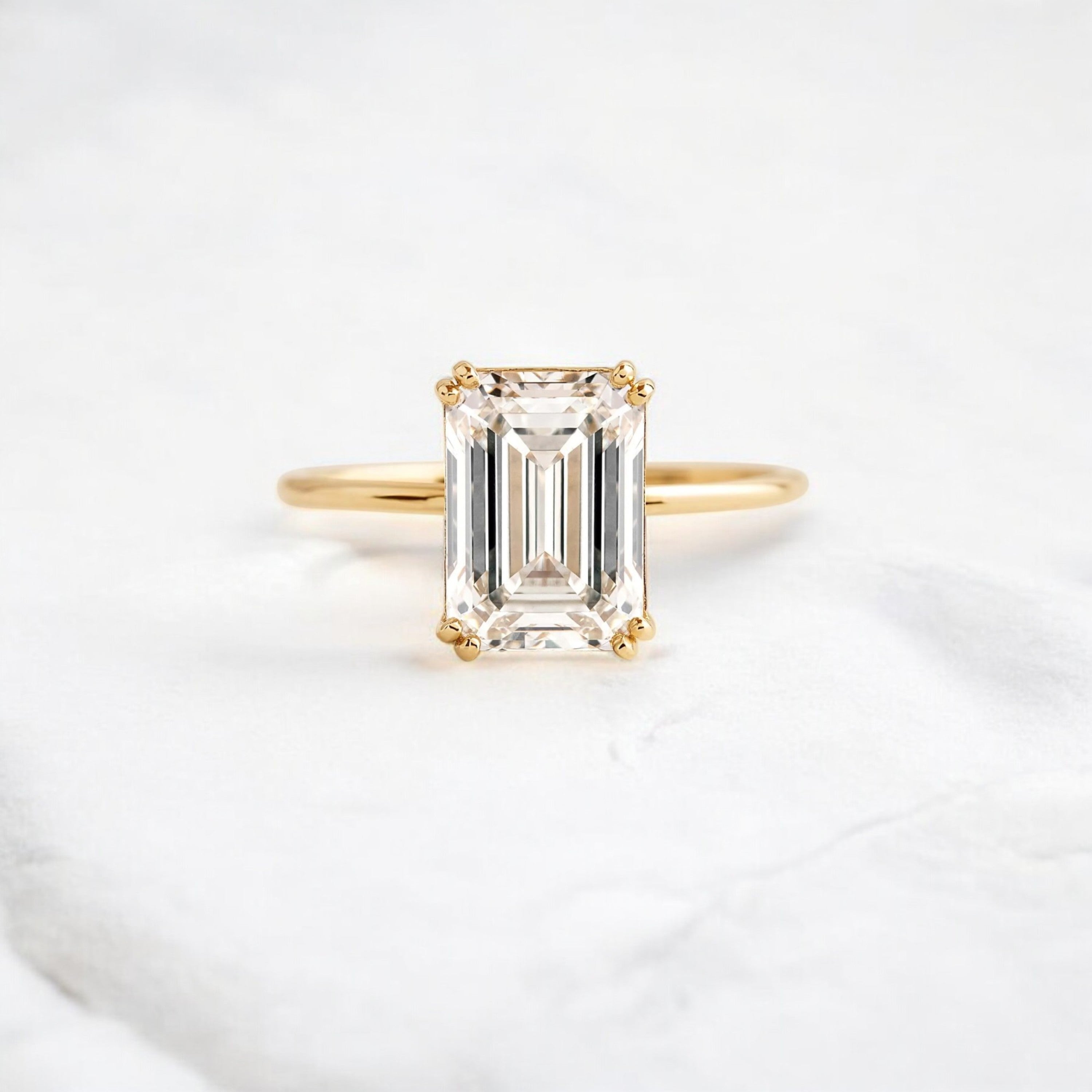 handmade-double-prong-emerald-solitaire-moissanite-engagement-ring-3-05-ct-yellow-gold-gemfora
