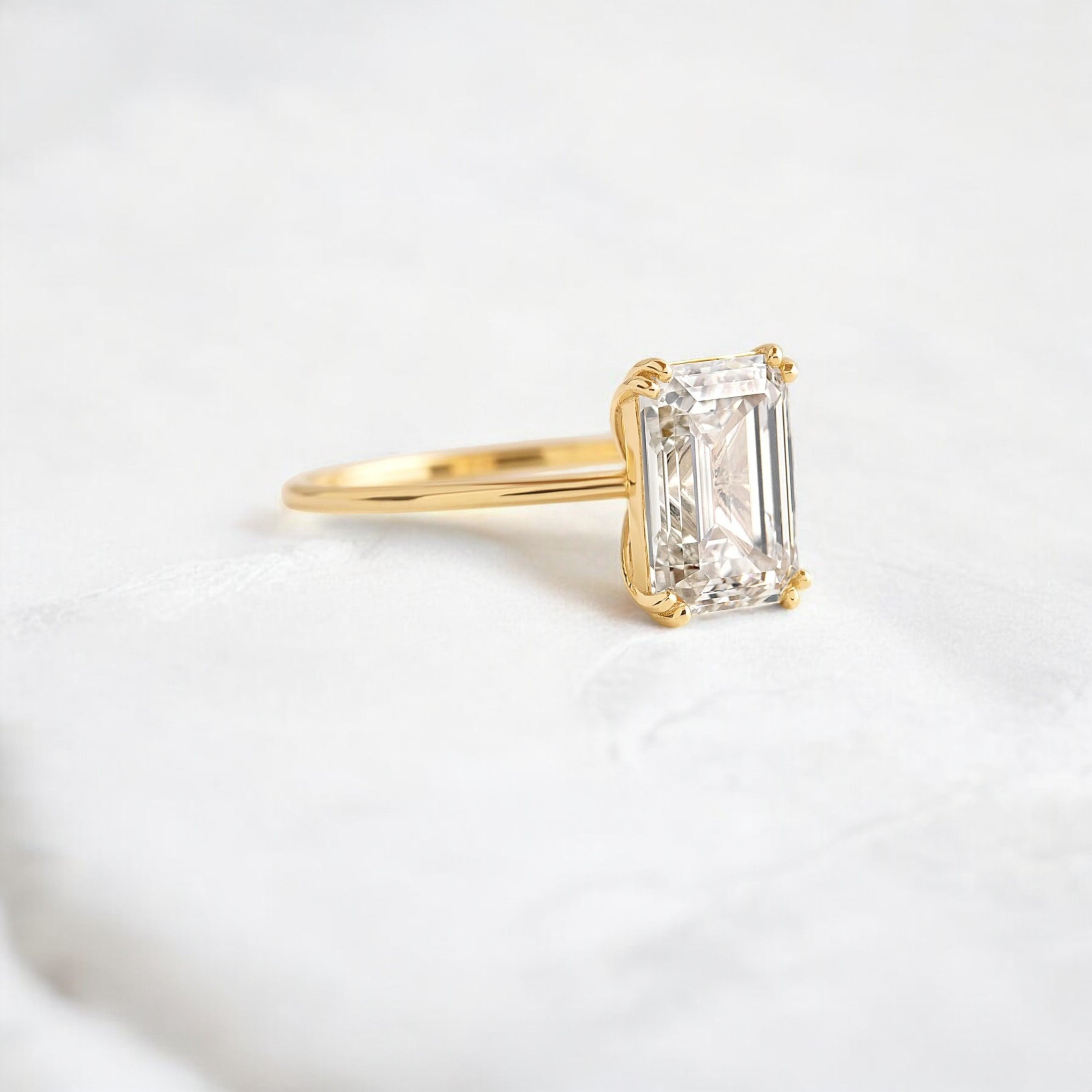 handmade-double-prong-emerald-solitaire-moissanite-engagement-ring-3-05-ct-yellow-gold-gemfora