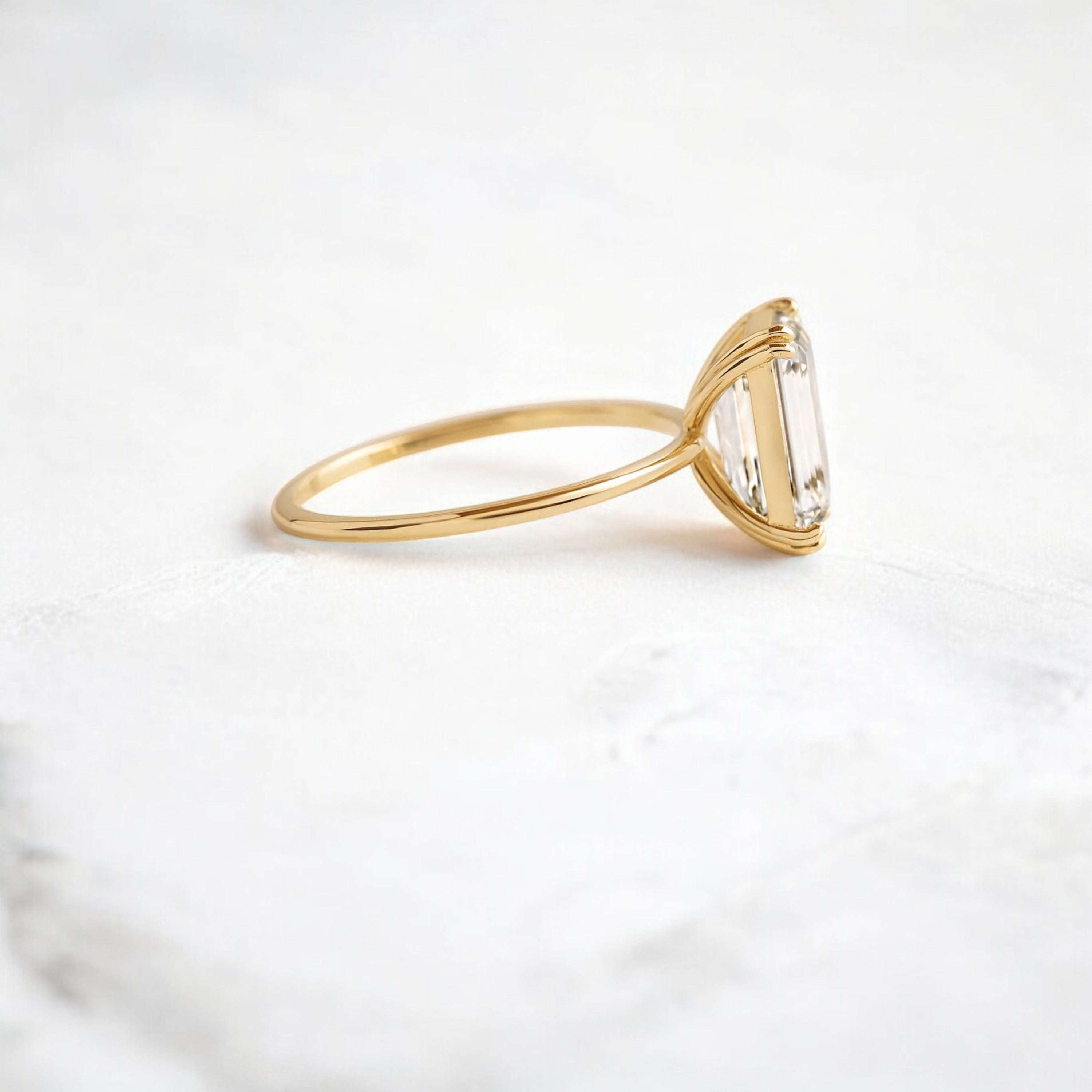 handmade-double-prong-emerald-solitaire-moissanite-engagement-ring-3-05-ct-yellow-gold-gemfora