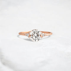 handmade-round-cut-1.14ct-moissanite-engagement-ring-with-closed-basket-and-two-tab-prongs-rose-gold-gemfora-1