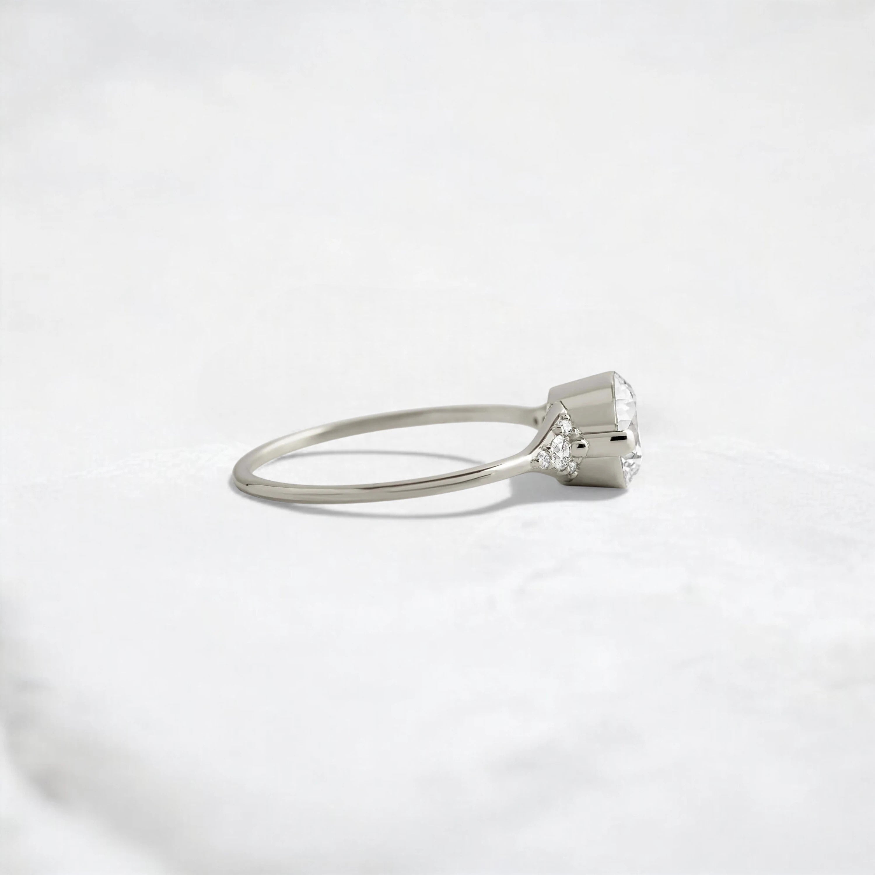 handmade-round-cut-1.14ct-moissanite-engagement-ring-with-closed-basket-and-two-tab-prongs-silver-gemfora-3