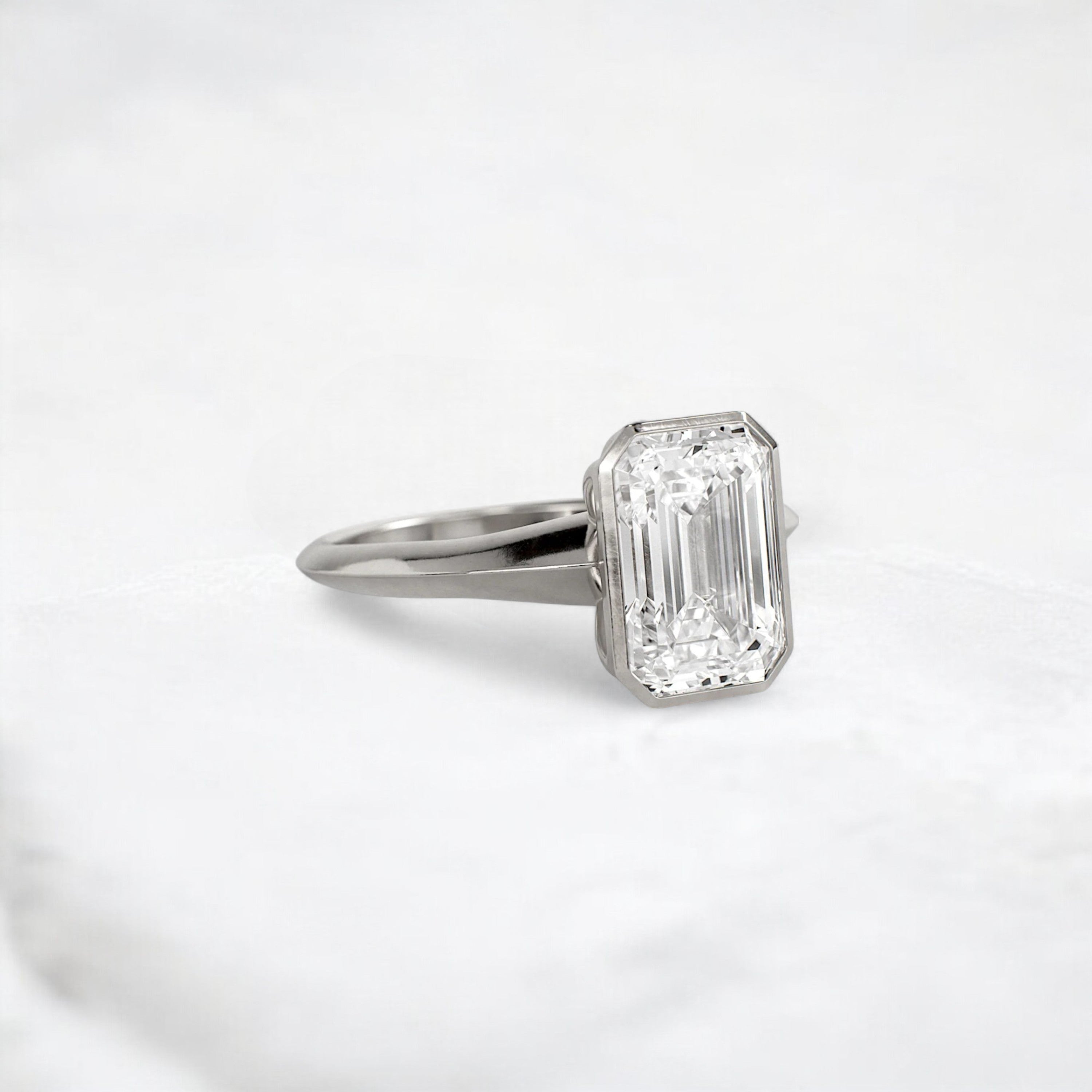 hidden-muse-emerald-glow-bezel-moissanite-engagement-ring-3-ct-platinum-gemfora-2