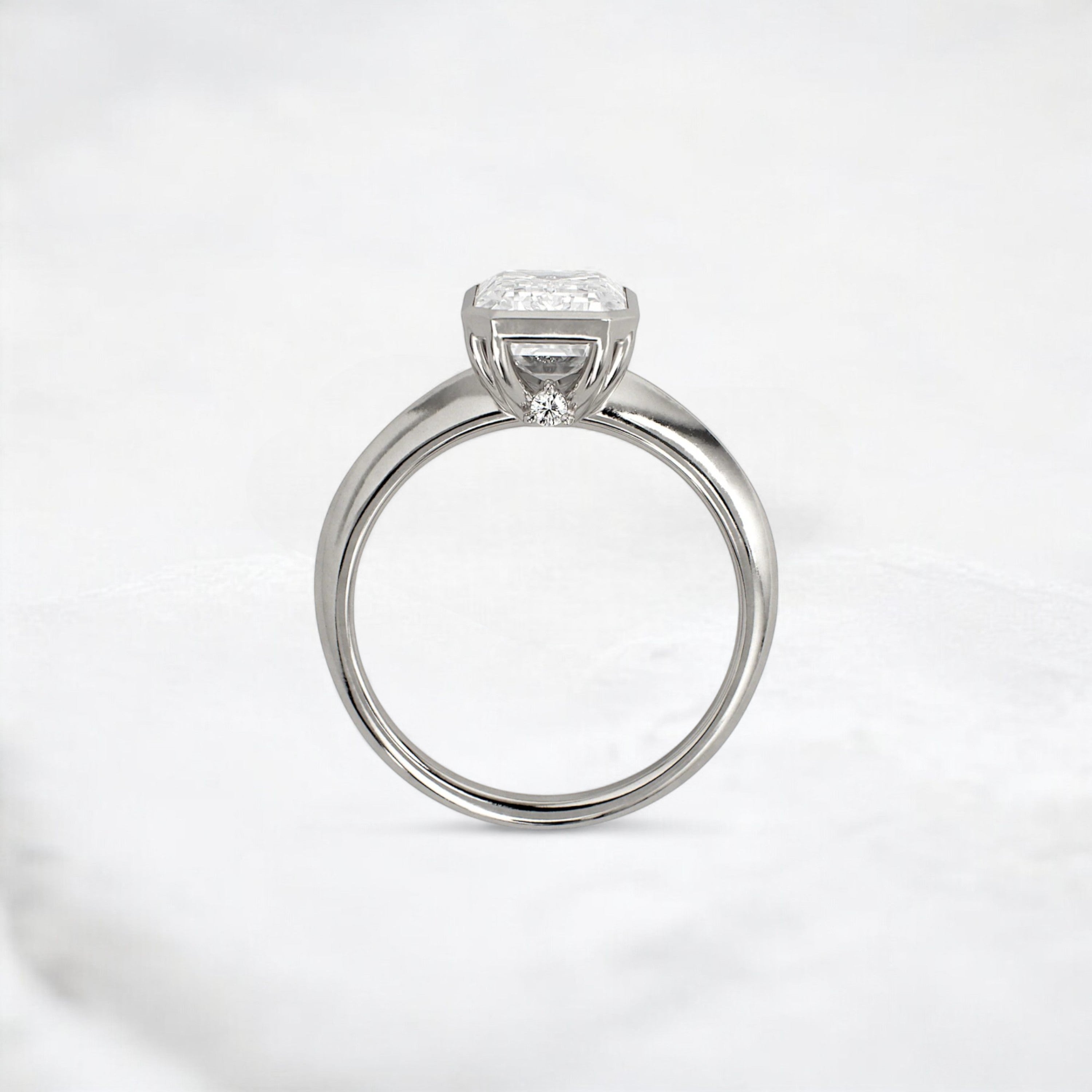 hidden-muse-emerald-glow-bezel-moissanite-engagement-ring-3-ct-platinum-gemfora-4