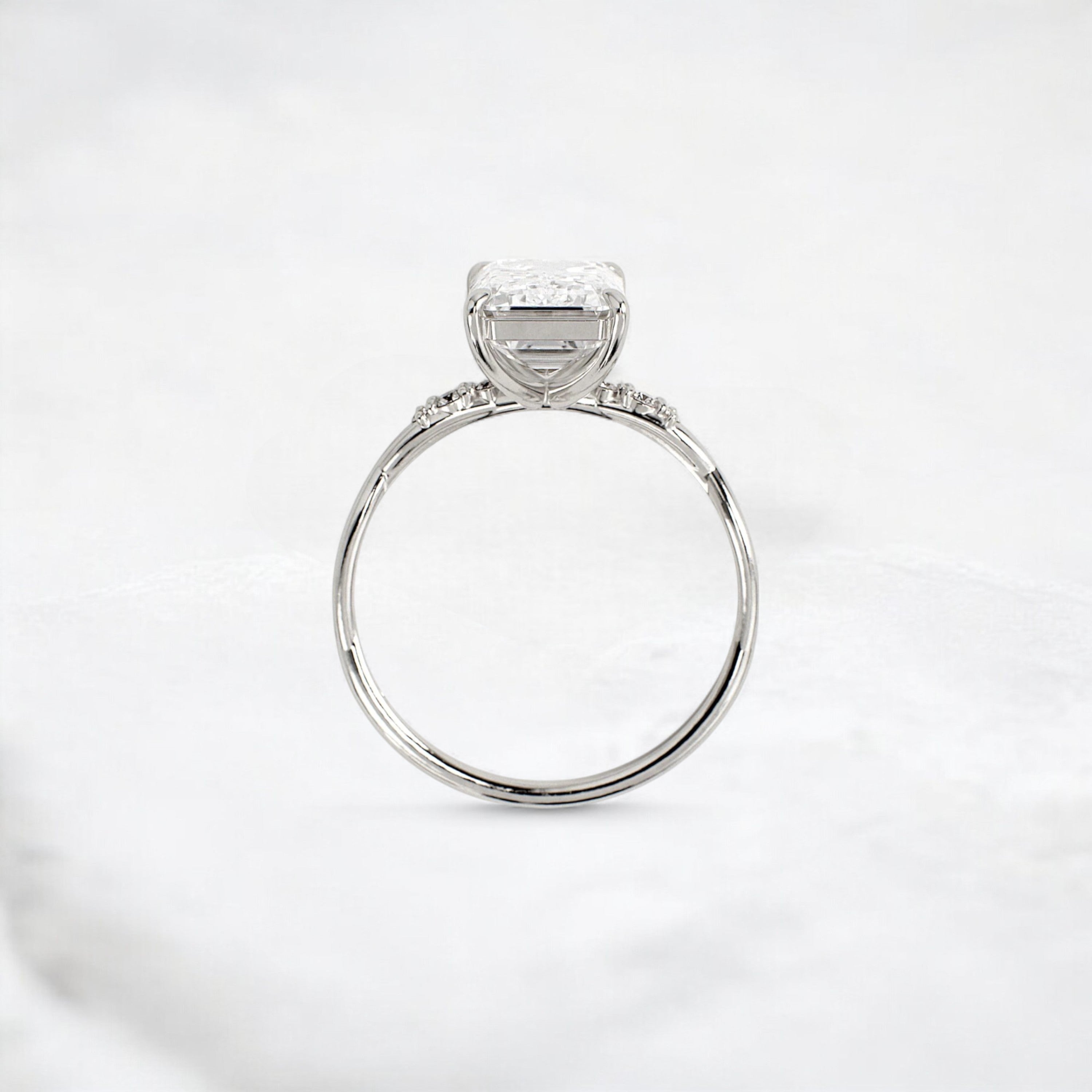 infinity-light-emerald-fire-twisted-moissanite-engagement-ring-3-ct-platinum-gemfora-4