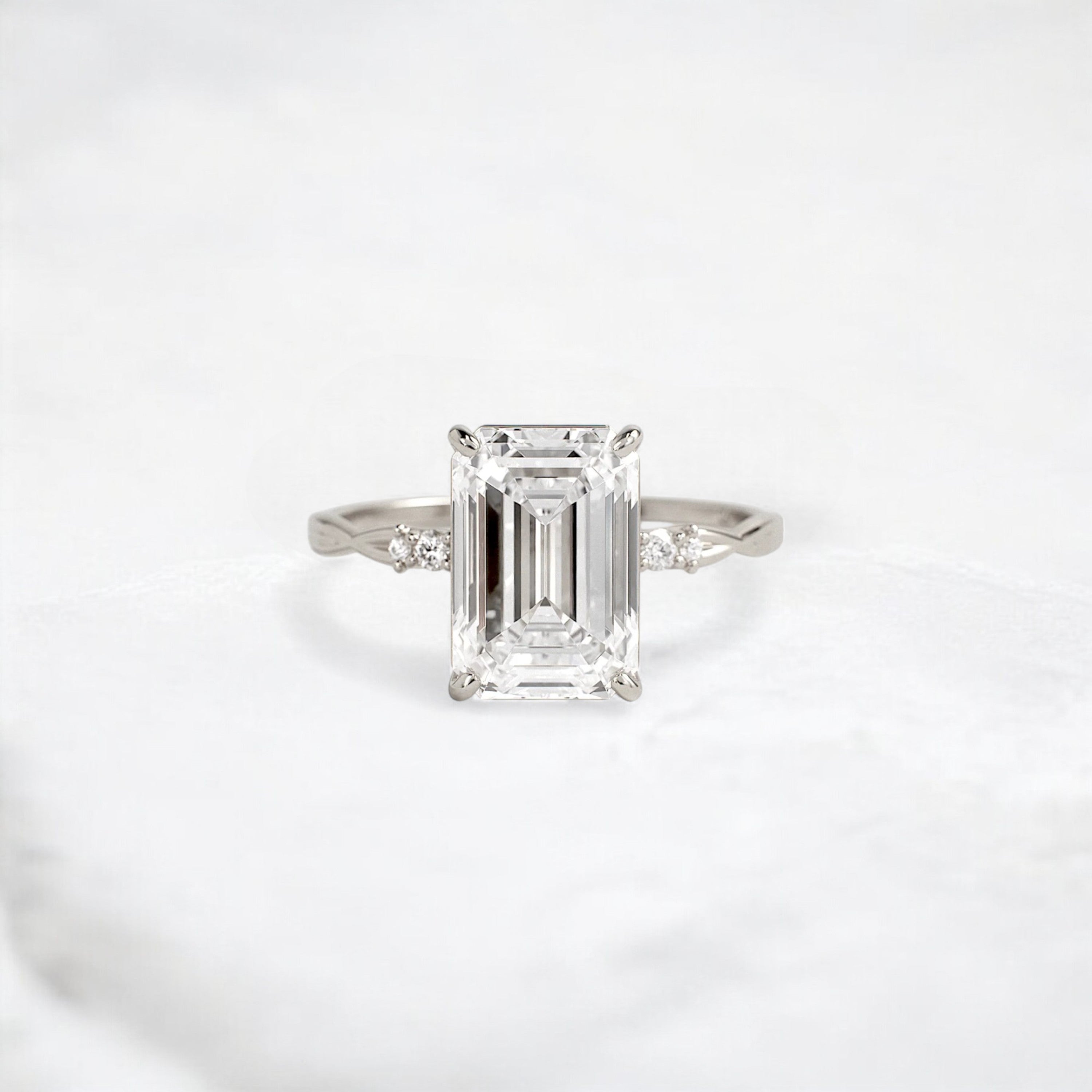 infinity-light-emerald-fire-twisted-moissanite-engagement-ring-3-ct-white-gold-gemfora-1