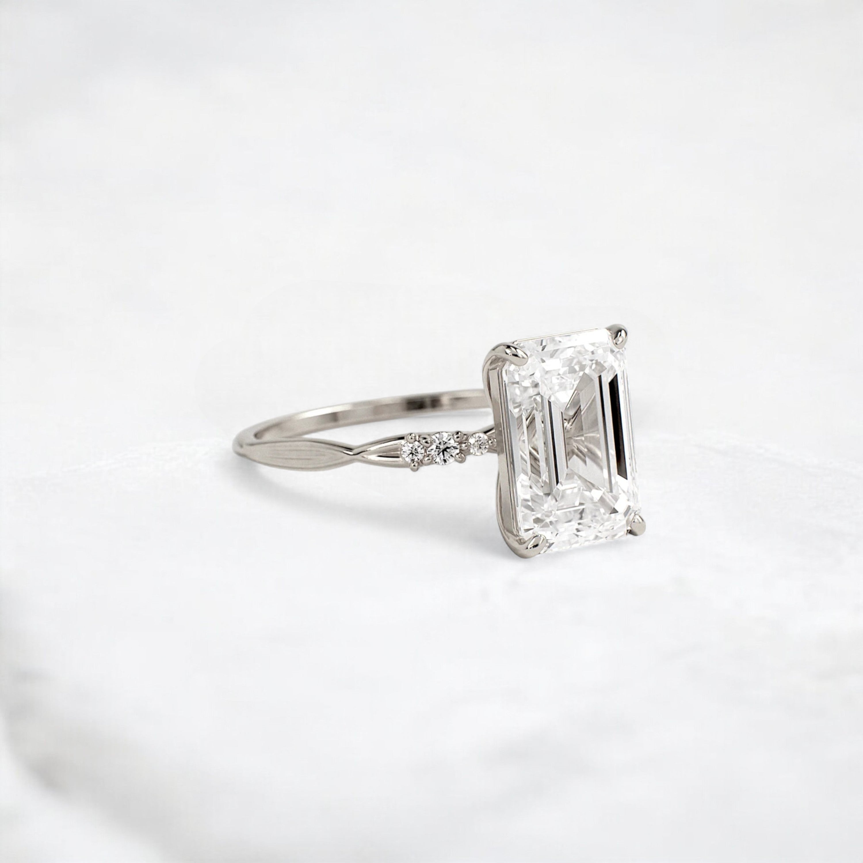 infinity-light-emerald-fire-twisted-moissanite-engagement-ring-3-ct-white-gold-gemfora-2