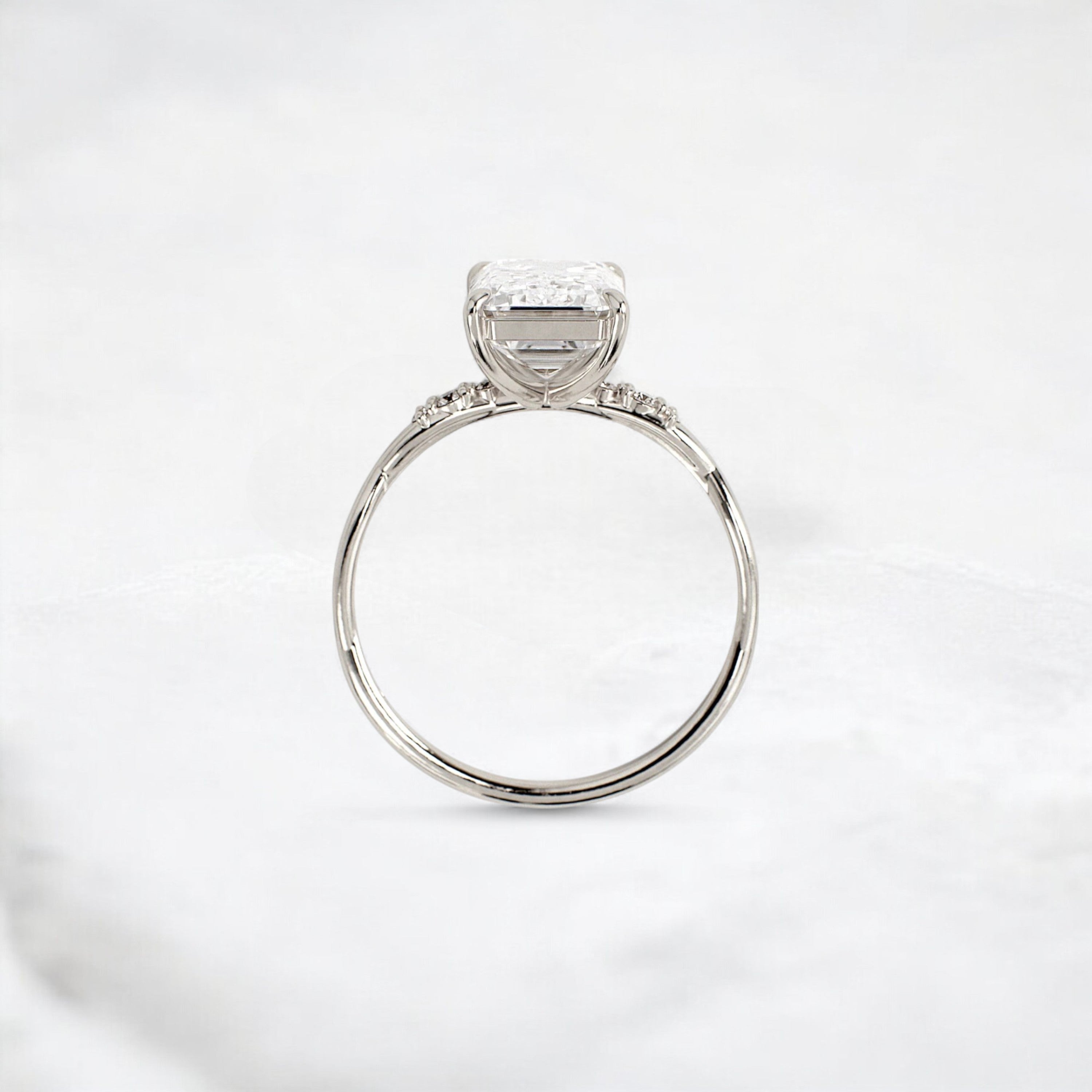infinity-light-emerald-fire-twisted-moissanite-engagement-ring-3-ct-white-gold-gemfora-4