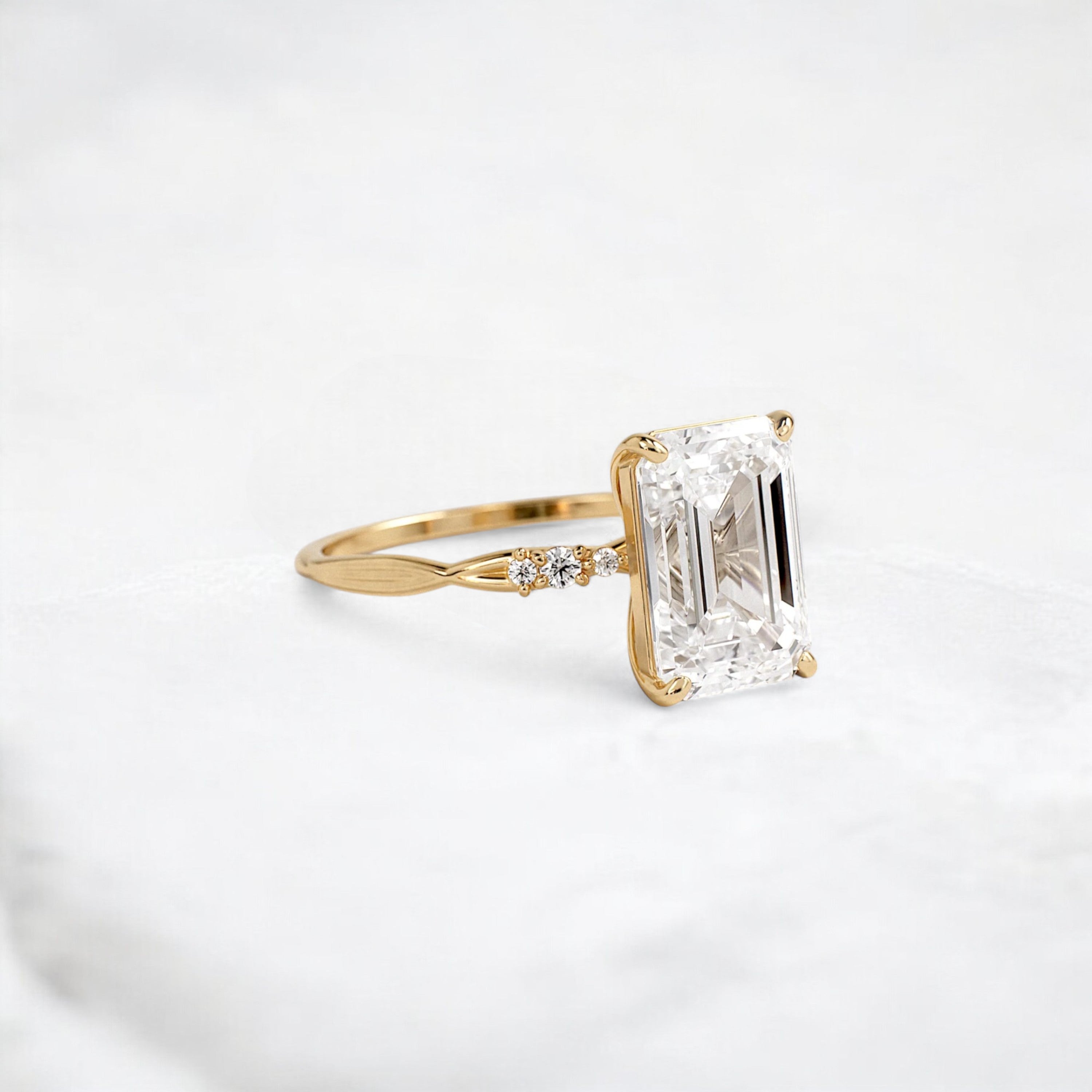 infinity-light-emerald-fire-twisted-moissanite-engagement-ring-3-ct-yellow-gold-gemfora-2