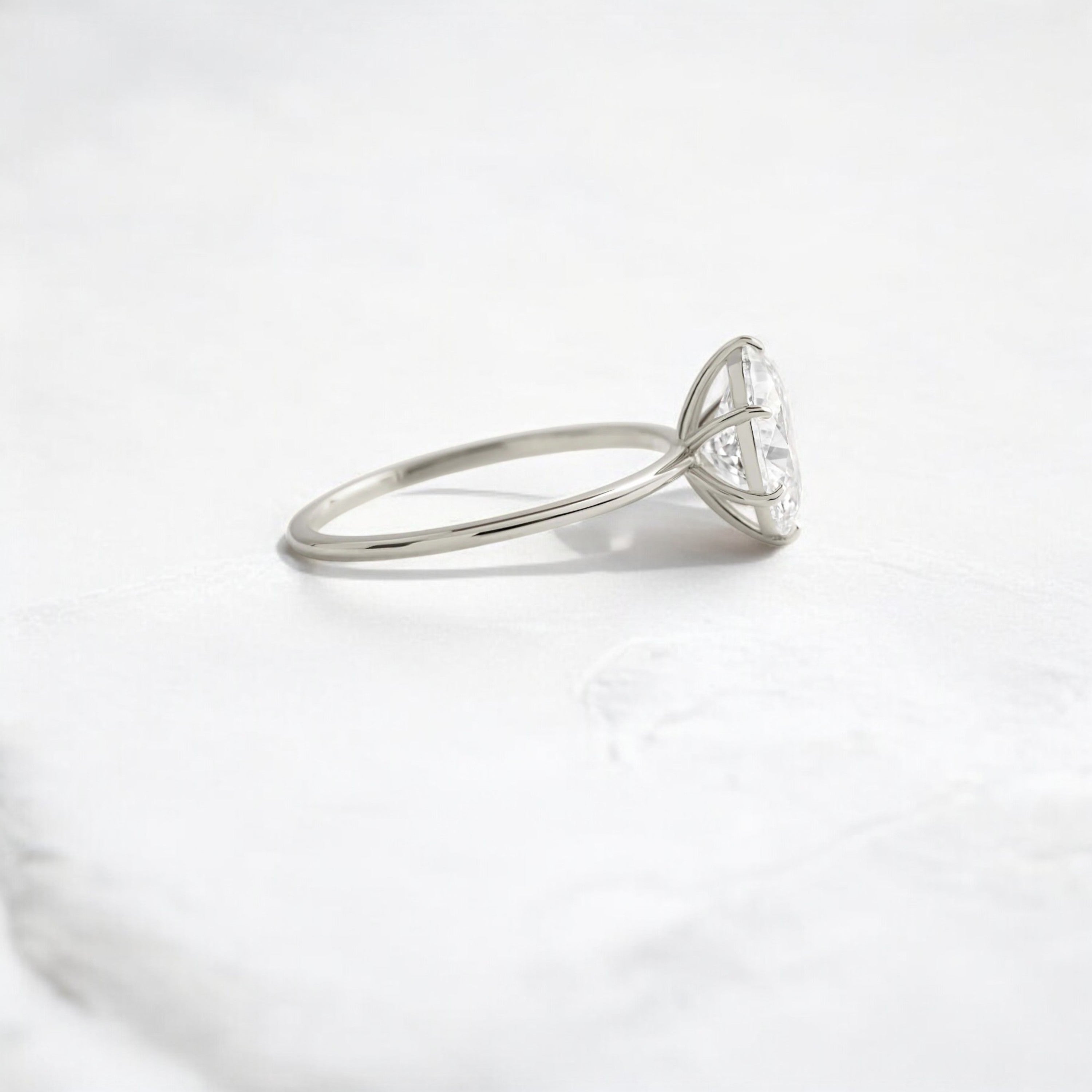 moissanite-1-33-ct-oval-cut-solitaire-handcrafted-platinum-engagement-ring-gemfora