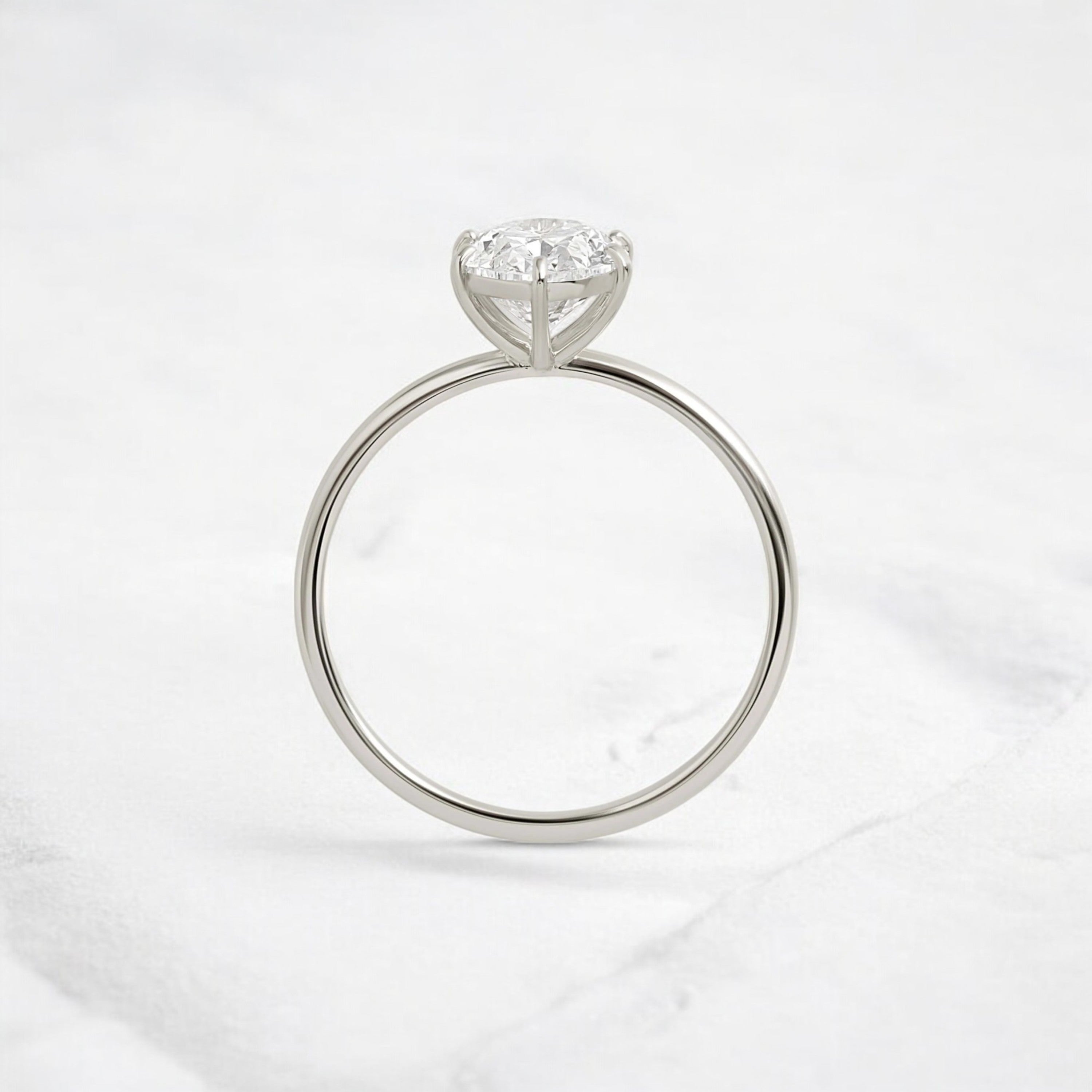 moissanite-1-33-ct-oval-cut-solitaire-handcrafted-platinum-engagement-ring-gemfora