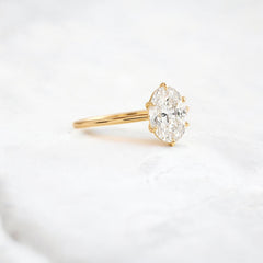 moissanite-1-33-ct-oval-cut-solitaire-handcrafted-yellow-gold-engagement-ring-gemfora
