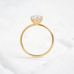 moissanite-1-33-ct-oval-cut-solitaire-handcrafted-yellow-gold-engagement-ring-gemfora