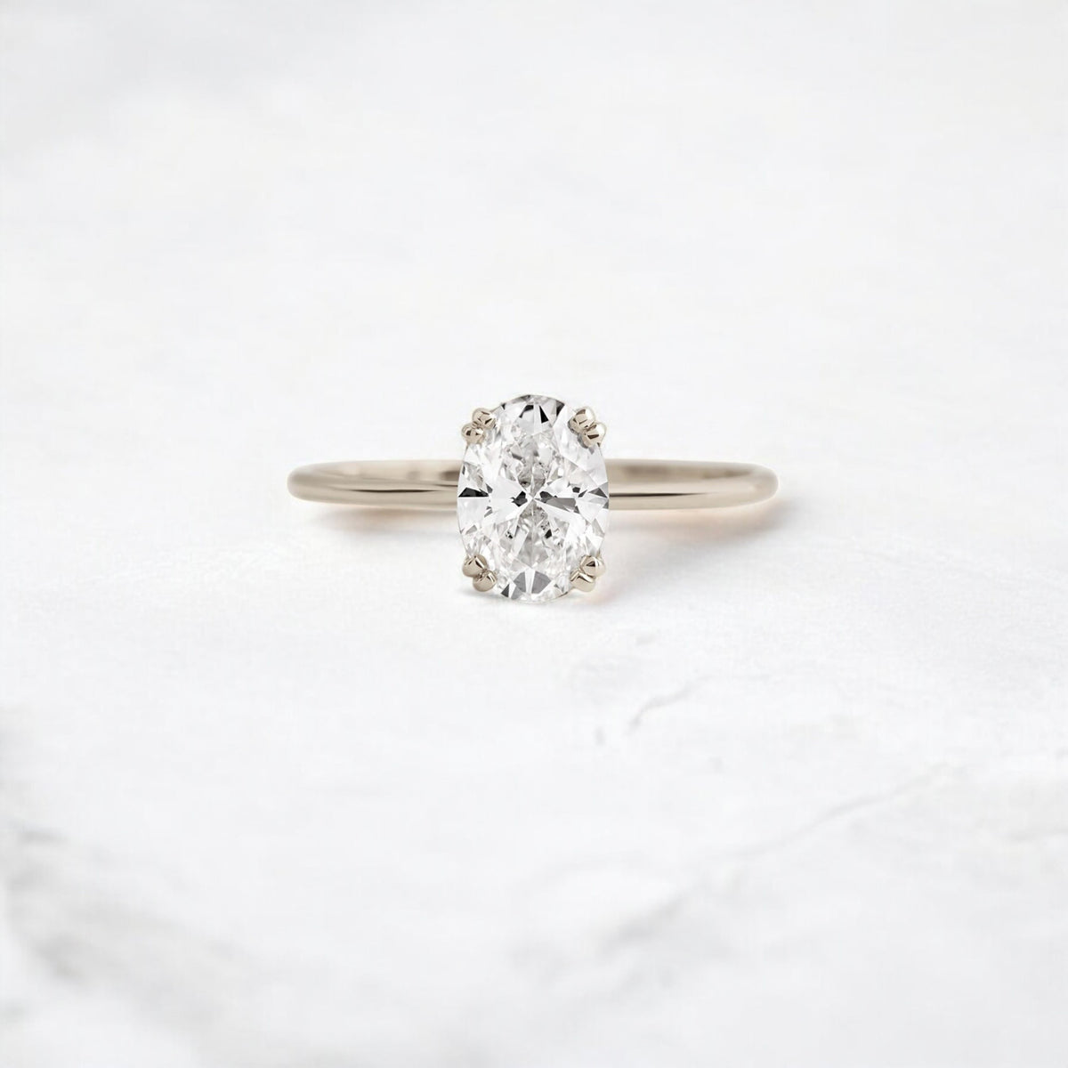 oval-cut-solitaire-moissanite-engagement-ring-1-ct-handmade-double-button-prong-white-gold-gemfora