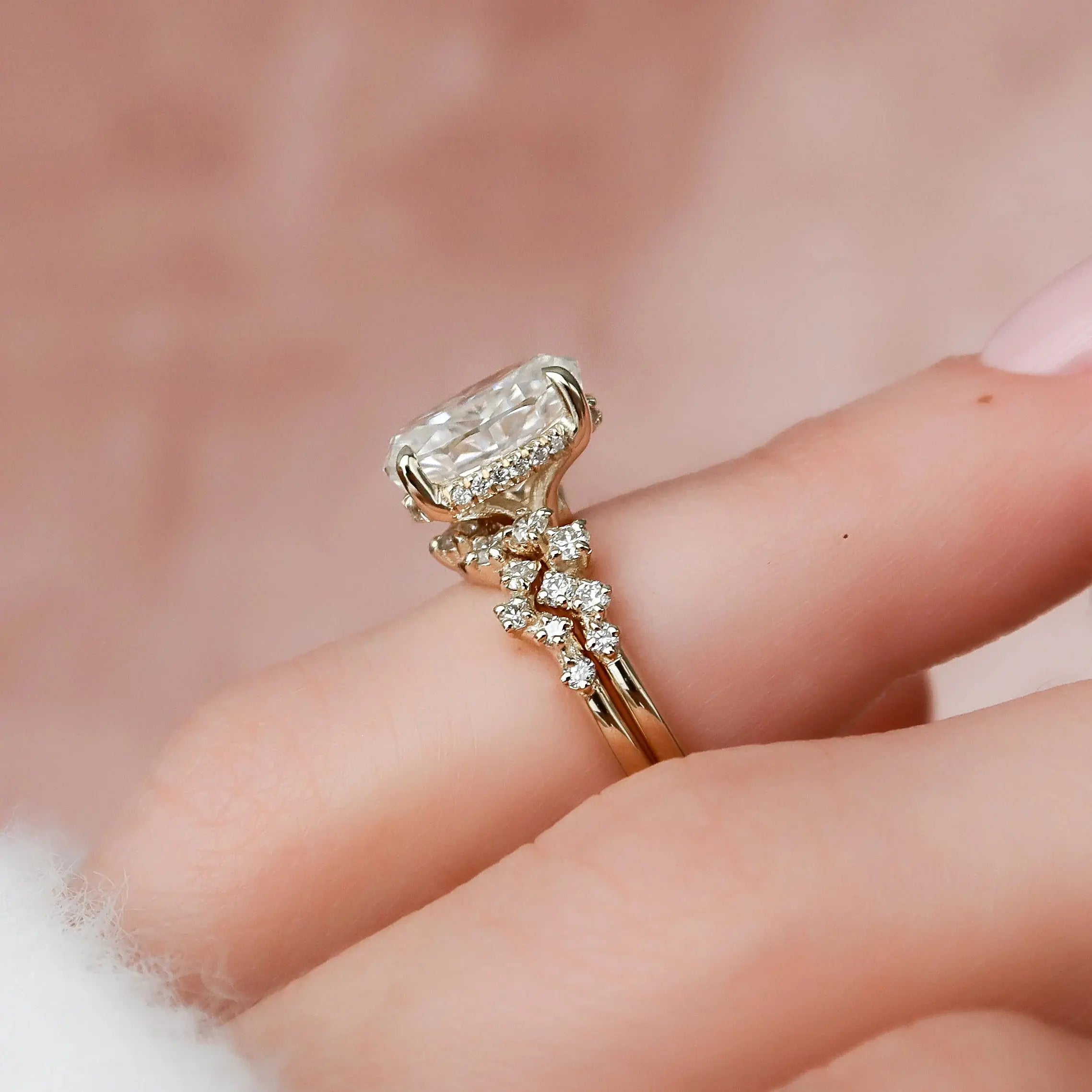 Oval moissanite engagement ring with wedding band