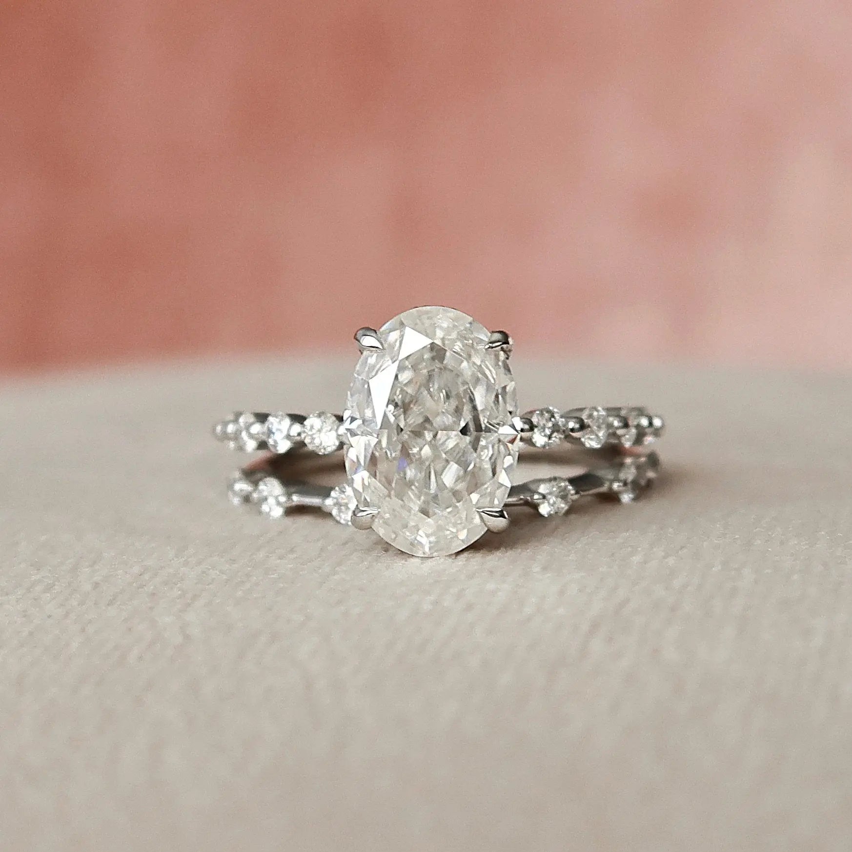Oval moissanite ring with matching eternity wedding band