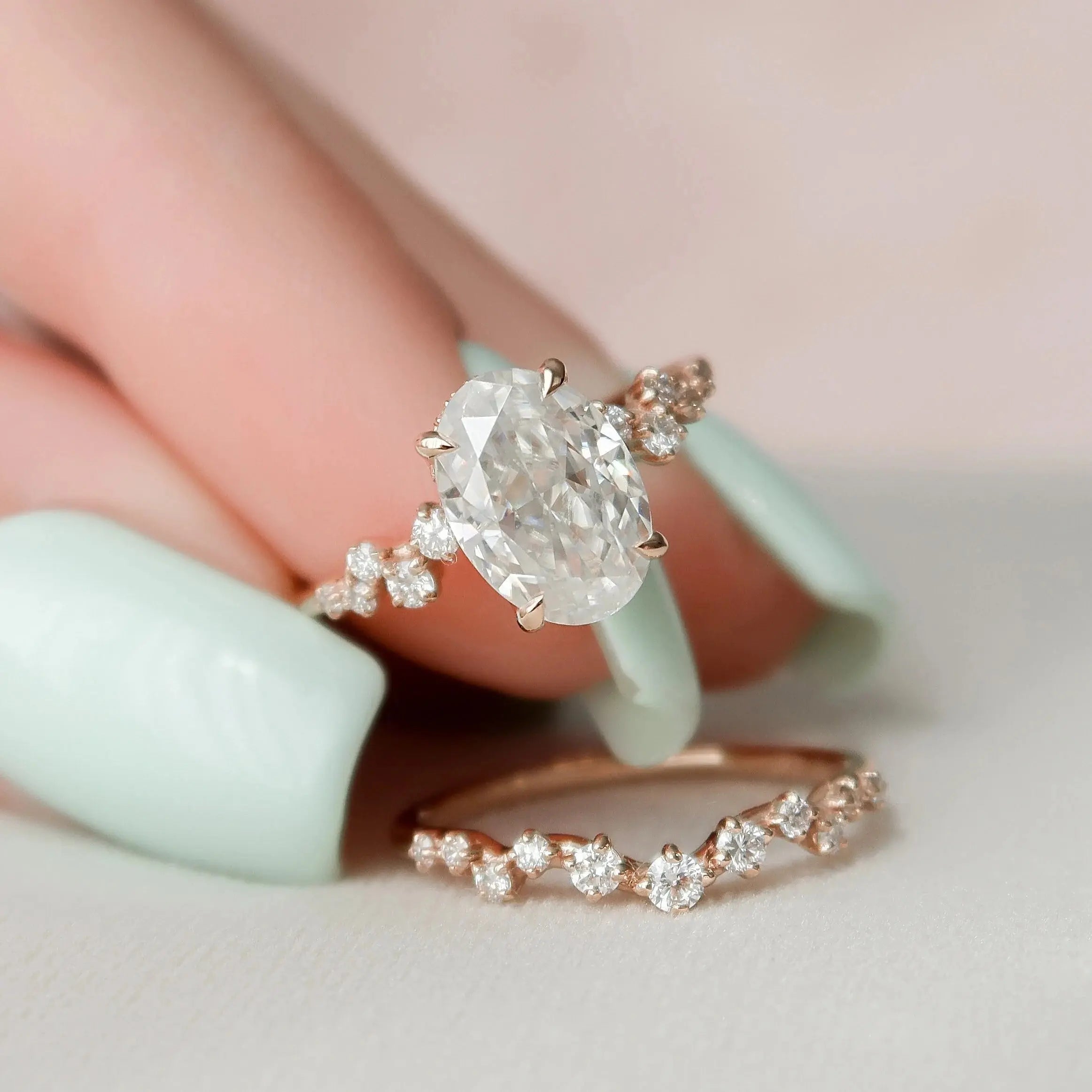 Oval moissanite ring with zig-zag wedding band