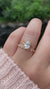oval-cut-solitaire-moissanite-engagement-ring-2-ct-handmade-double-button-prong-yellow-gold-gemfora-video