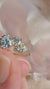 side-serenade-round-cut-harmony-moissanite-engagement-ring-video-gemfora