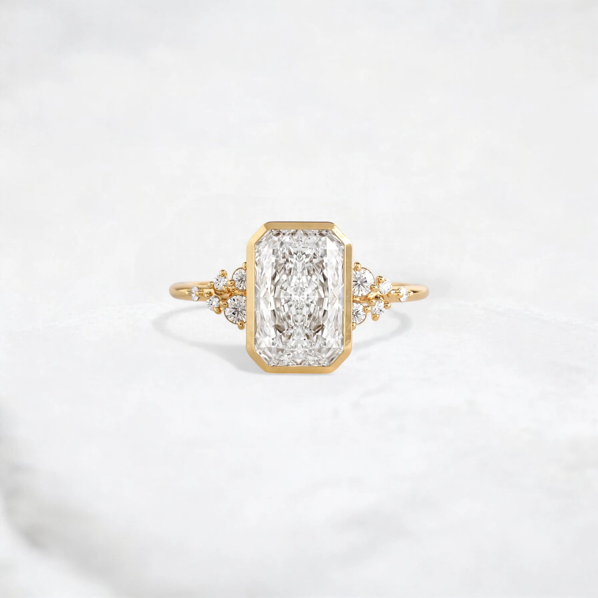 radiant-cut-2ct-bezel-with-cluster-engagement-ring-1