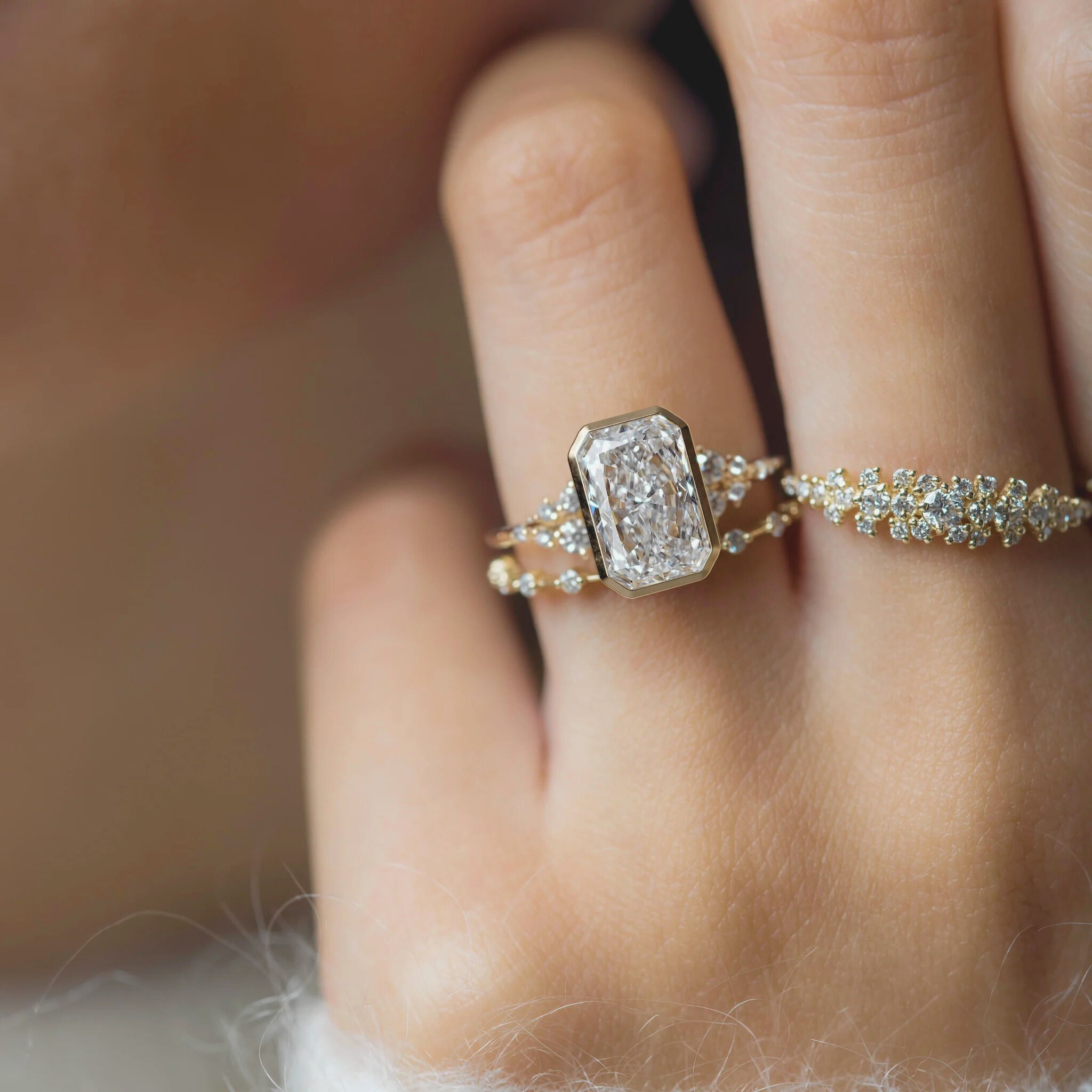 radiant-cut-2ct-bezel-with-cluster-engagement-ring-2