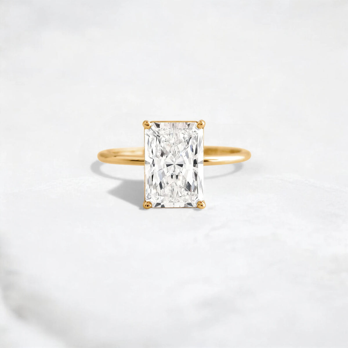 radiant-cut-2ct-focal-diamond-solitaire-engagement-ring-1_51273941-3dcd-48d2-bdb8-21b9ef3732ca