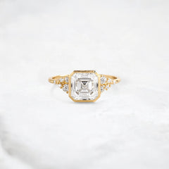 radiant-halo-asscher-bezel-set-2ct-cluster-engagement-ring-1