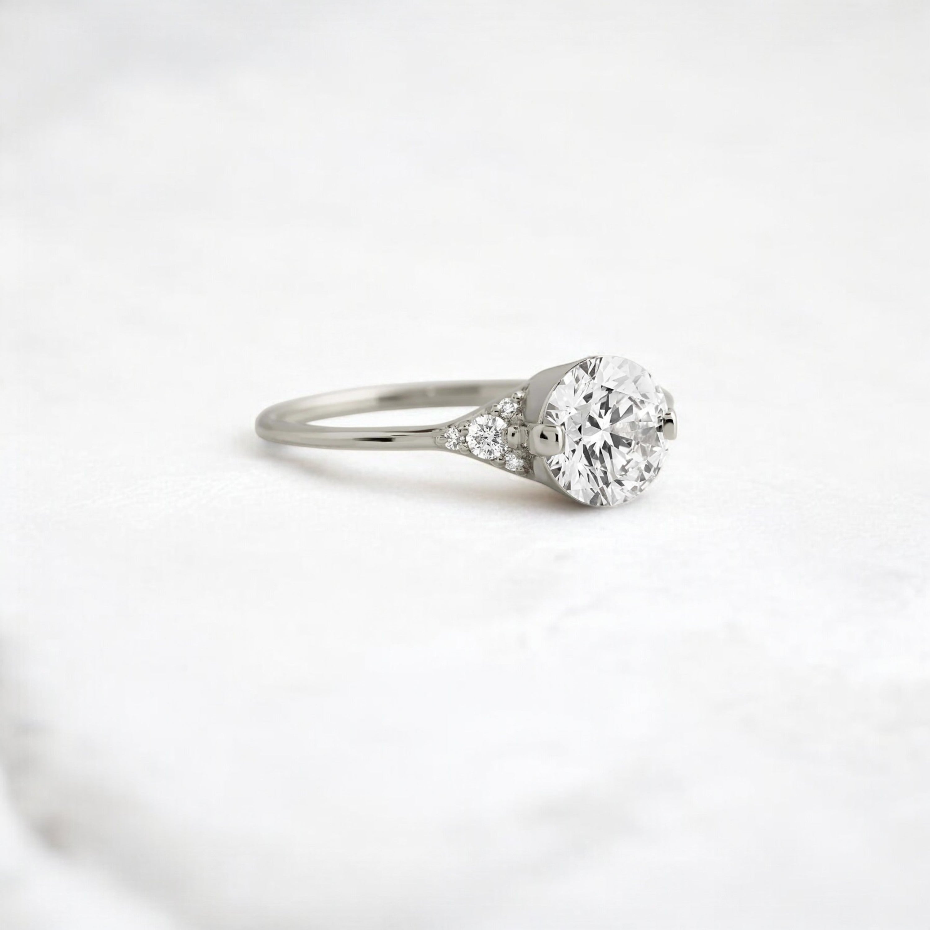 round-cut-1-14-ct-moissanite-engagement-closed-basket-two-tab-prongs-ring