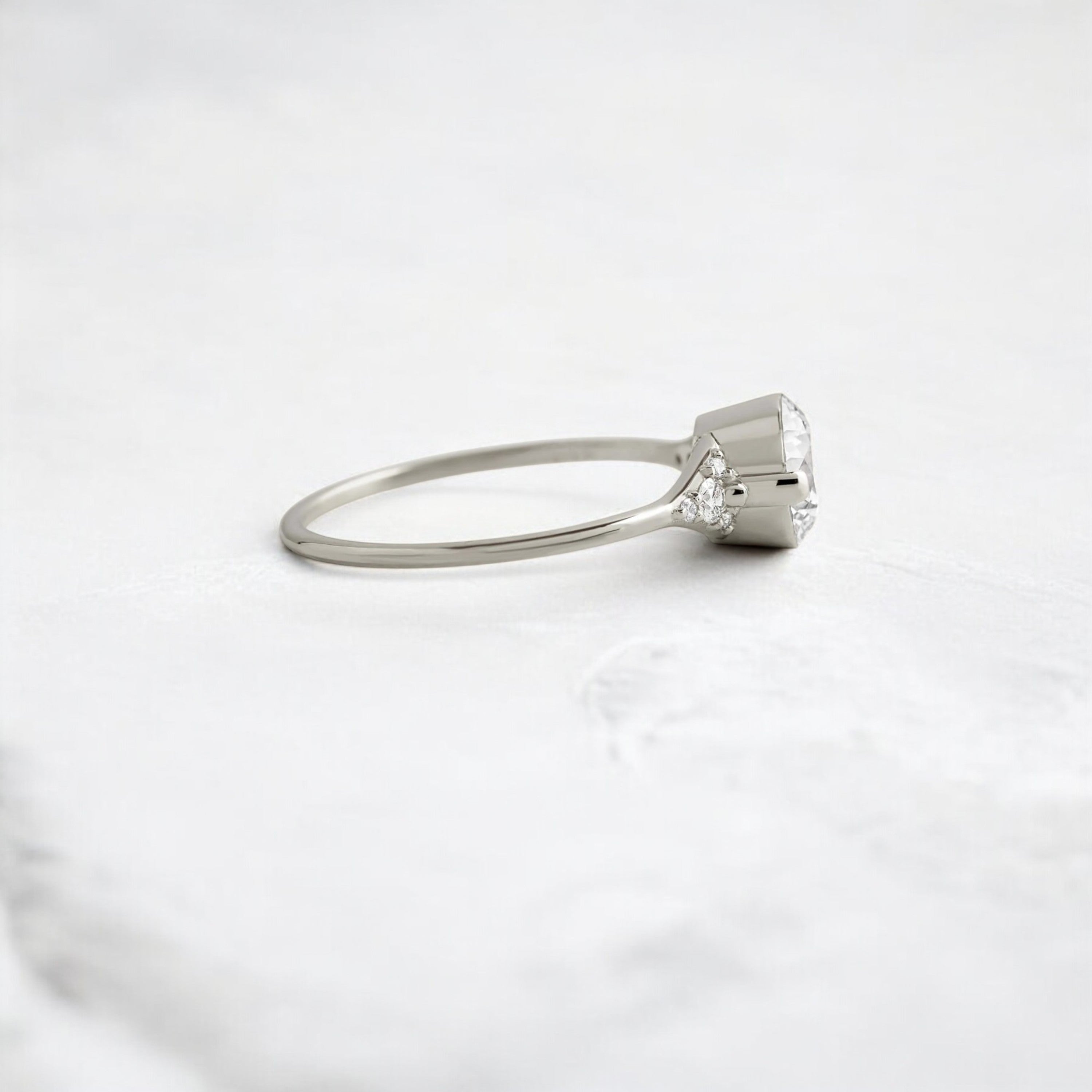 round-cut-1-14-ct-moissanite-engagement-closed-basket-two-tab-prongs-ring