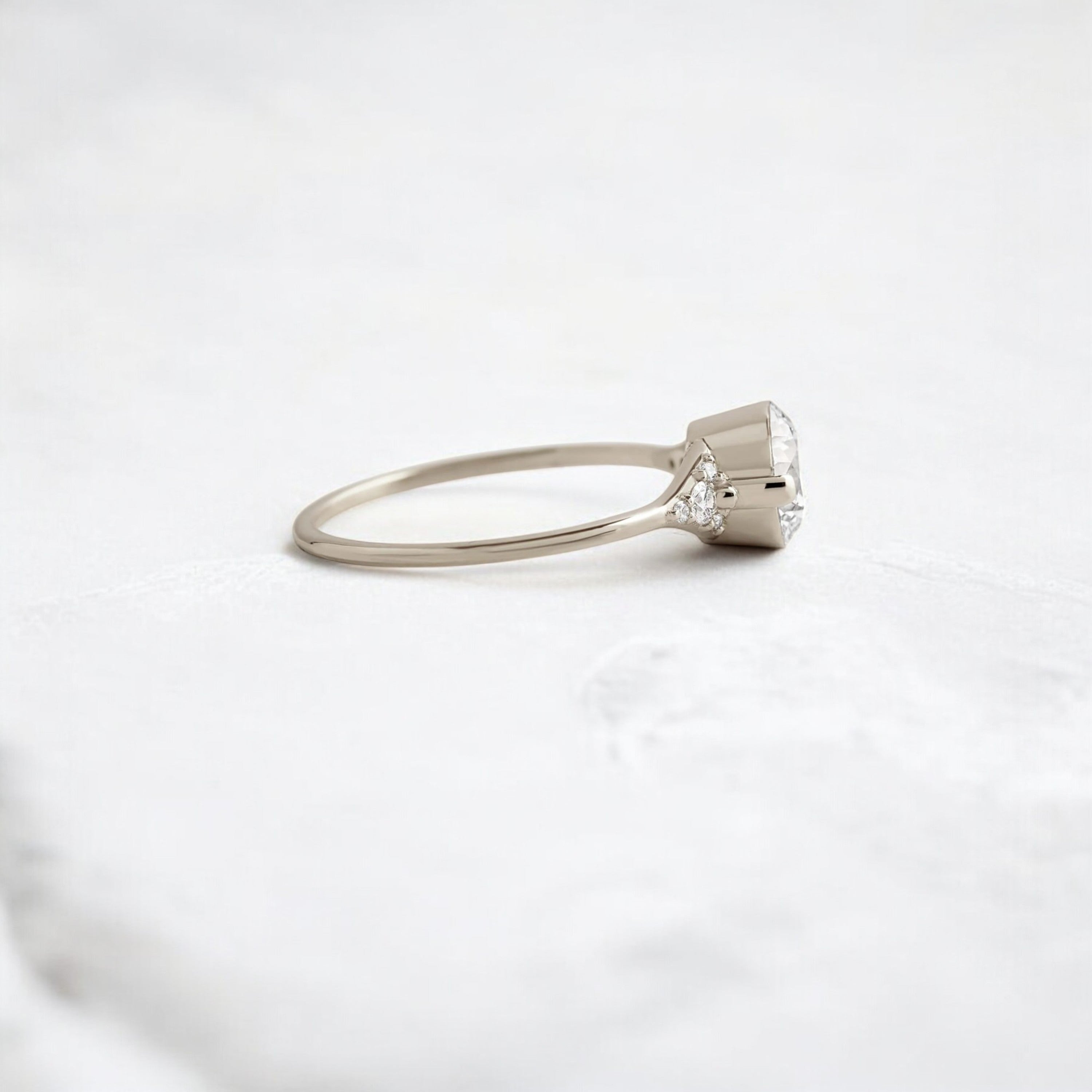 round-cut-1-14-ct-moissanite-engagement-closed-basket-two-tab-prongs-ring