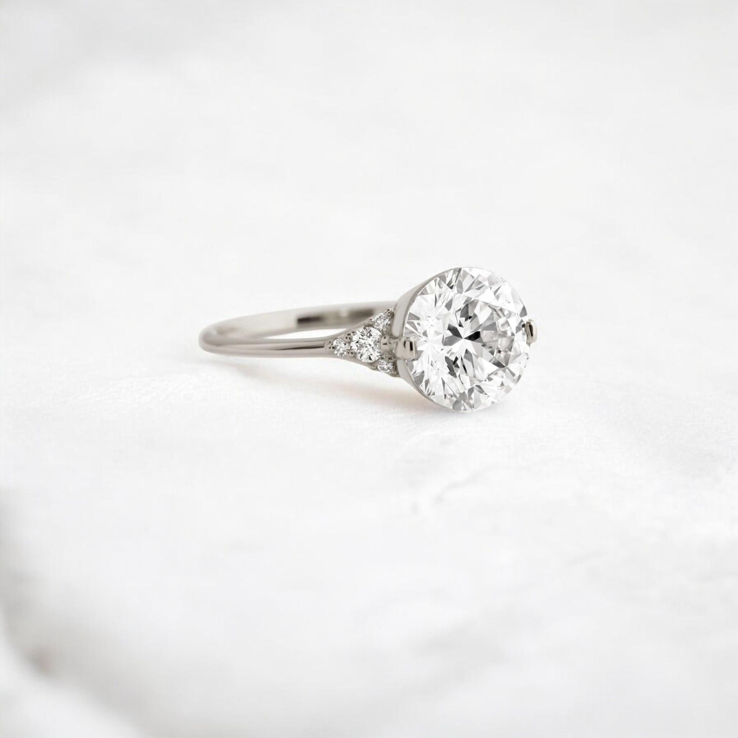 round-cut-2-07-ct-moissanite-engagement-closed-basket-two-tab-prongs-ring