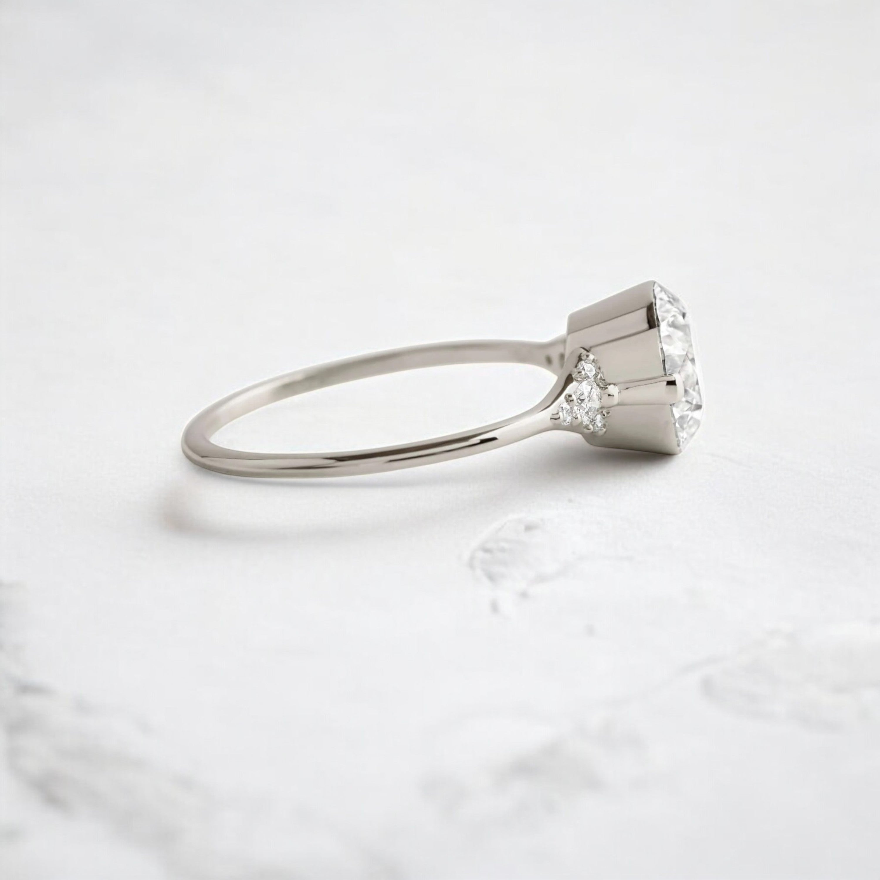 round-cut-2-07-ct-moissanite-engagement-closed-basket-two-tab-prongs-ring