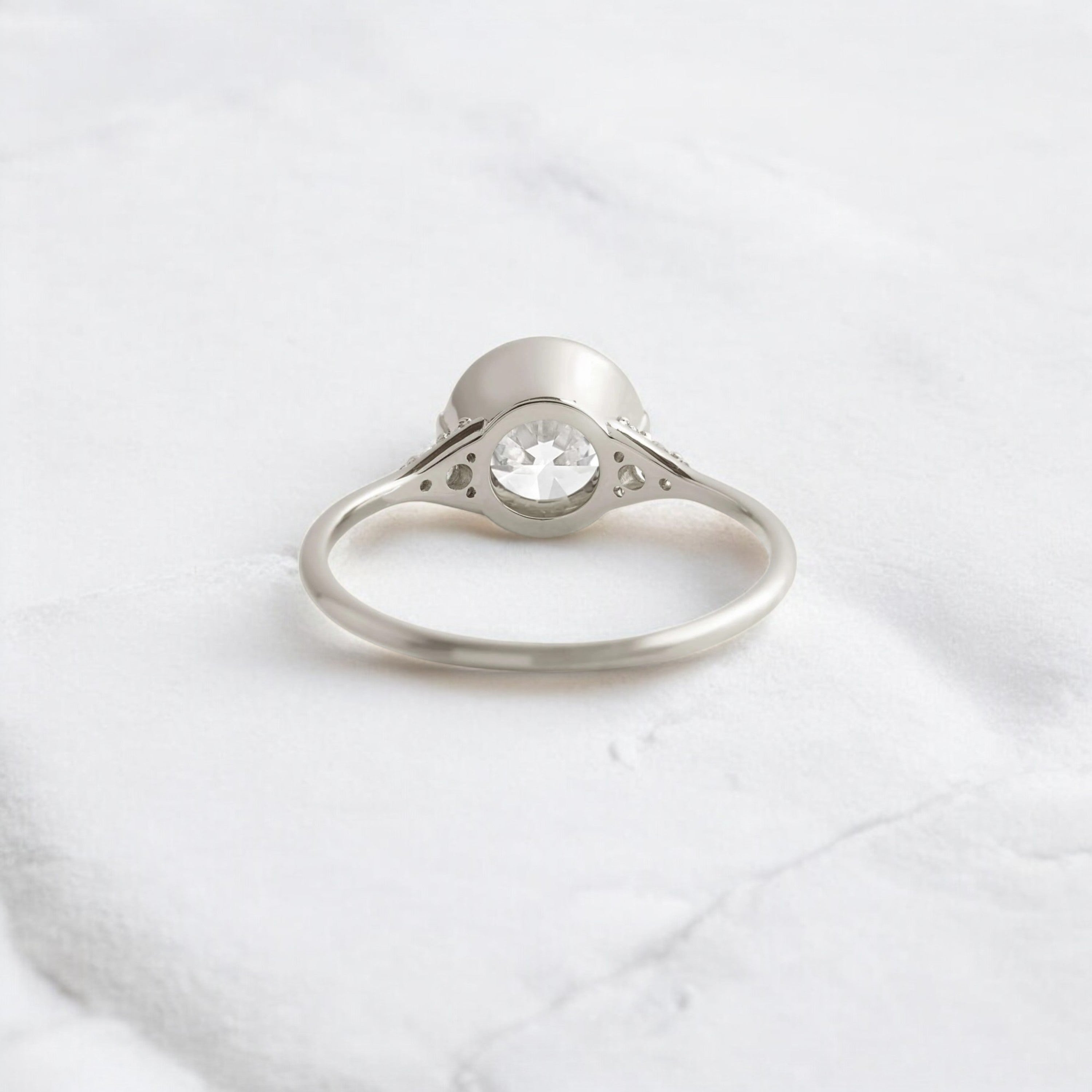 round-cut-2-07-ct-moissanite-engagement-closed-basket-two-tab-prongs-ring