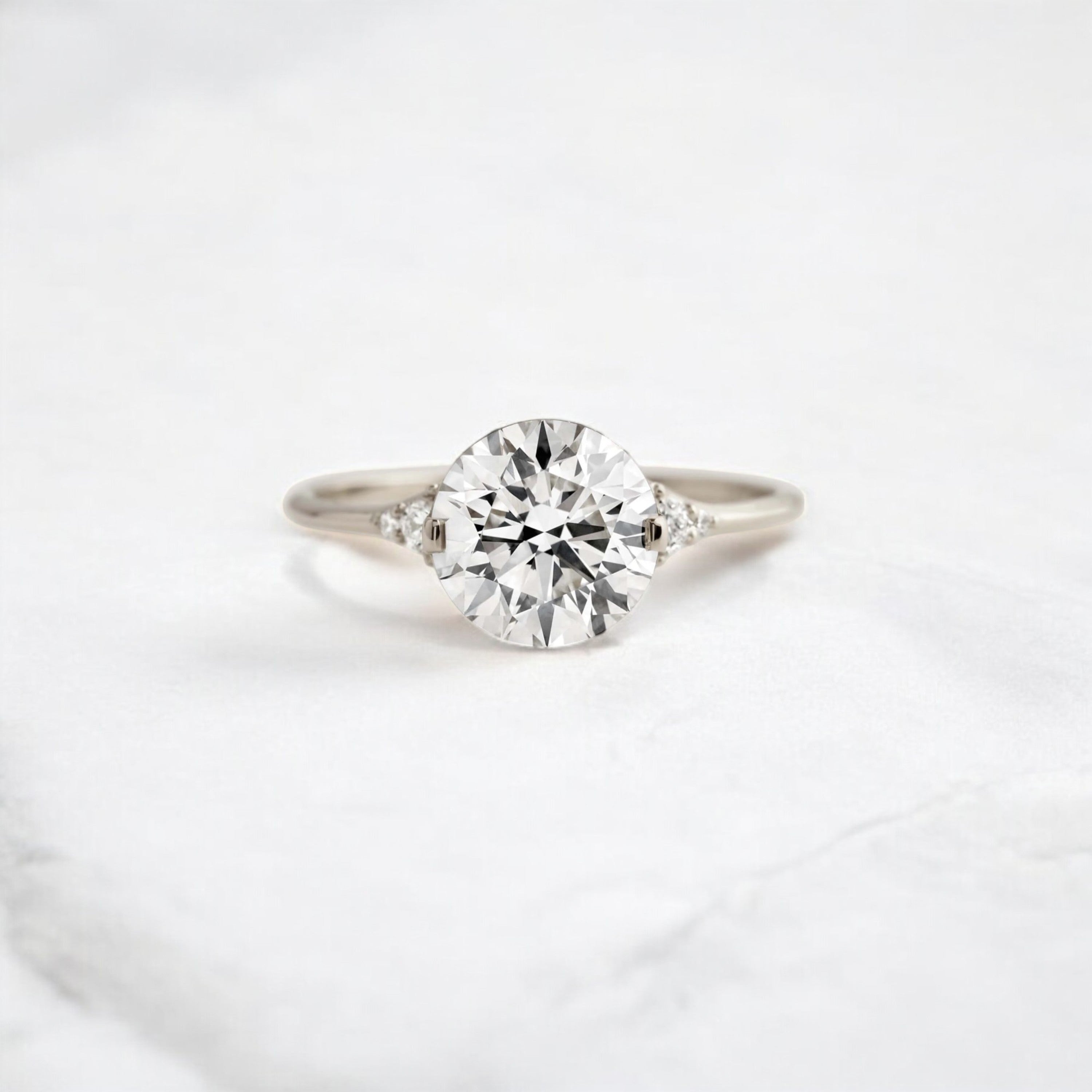 round-cut-2-07-ct-moissanite-engagement-closed-basket-two-tab-prongs-ring