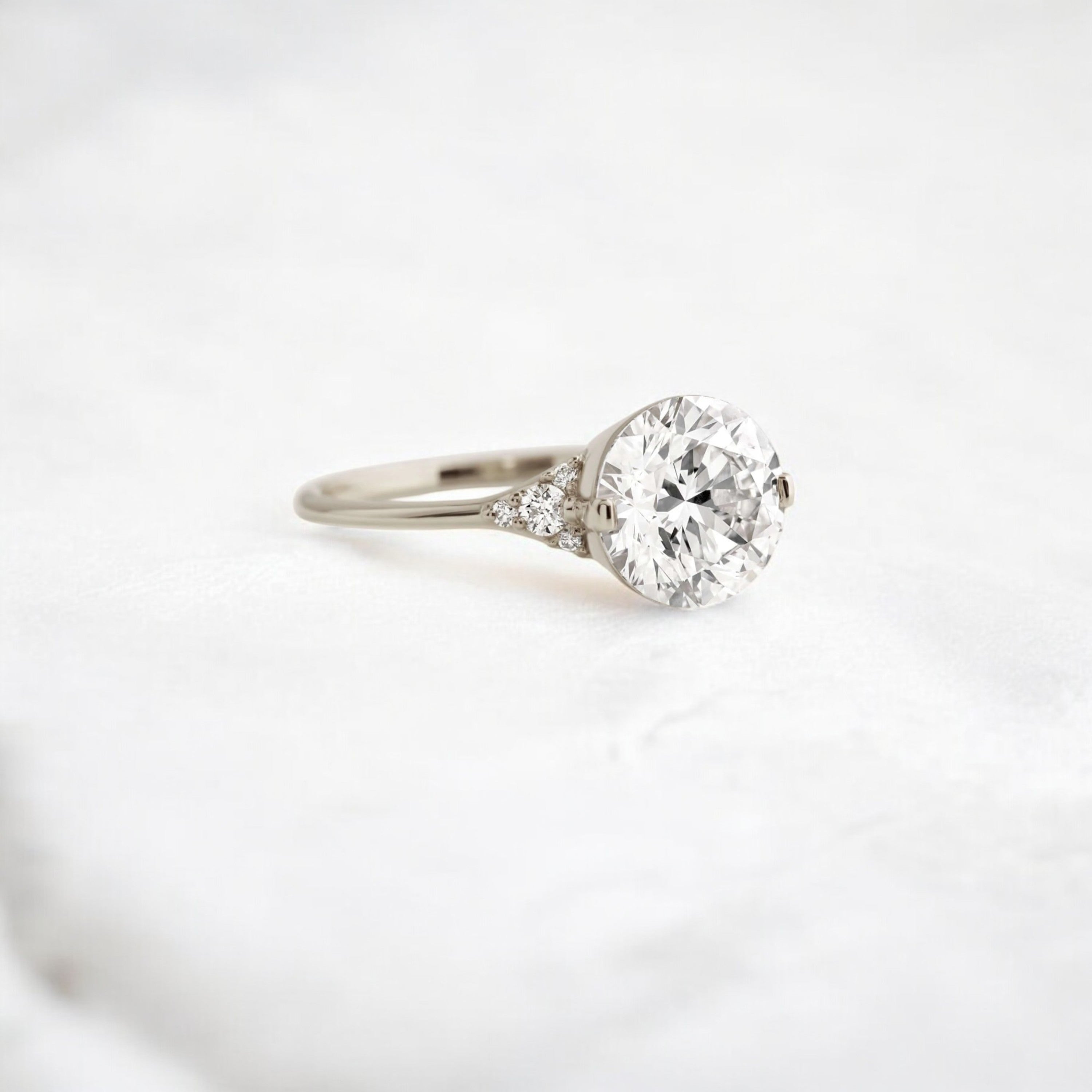 round-cut-2-07-ct-moissanite-engagement-closed-basket-two-tab-prongs-ring