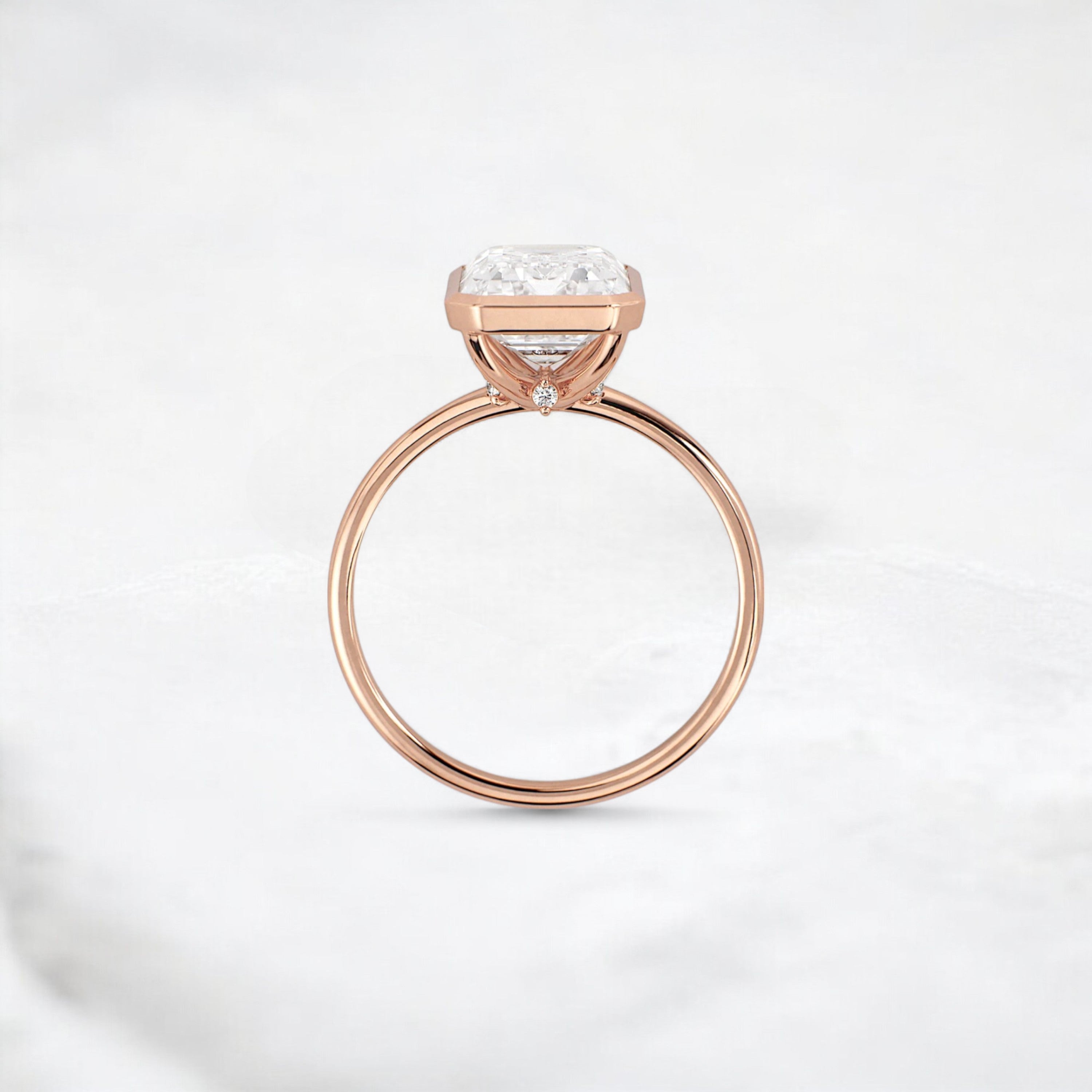secret-glimmer-emerald-cut-bezel-moissanite-engagement-ring-4-ct-rose-gold-gemfora-4