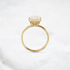 secret-glimmer-emerald-cut-bezel-moissanite-engagement-ring-4-ct-yellow-gold-gemfora-4