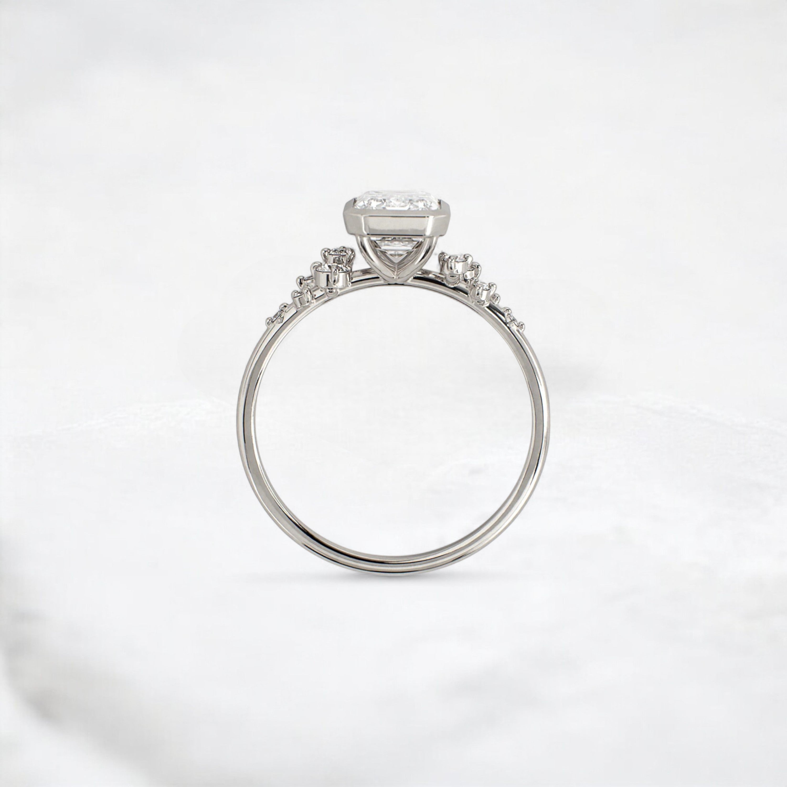 silent-luster-emerald-cluster-bezel-moissanite-engagement-ring-1-ct-platinum-gemfora-4
