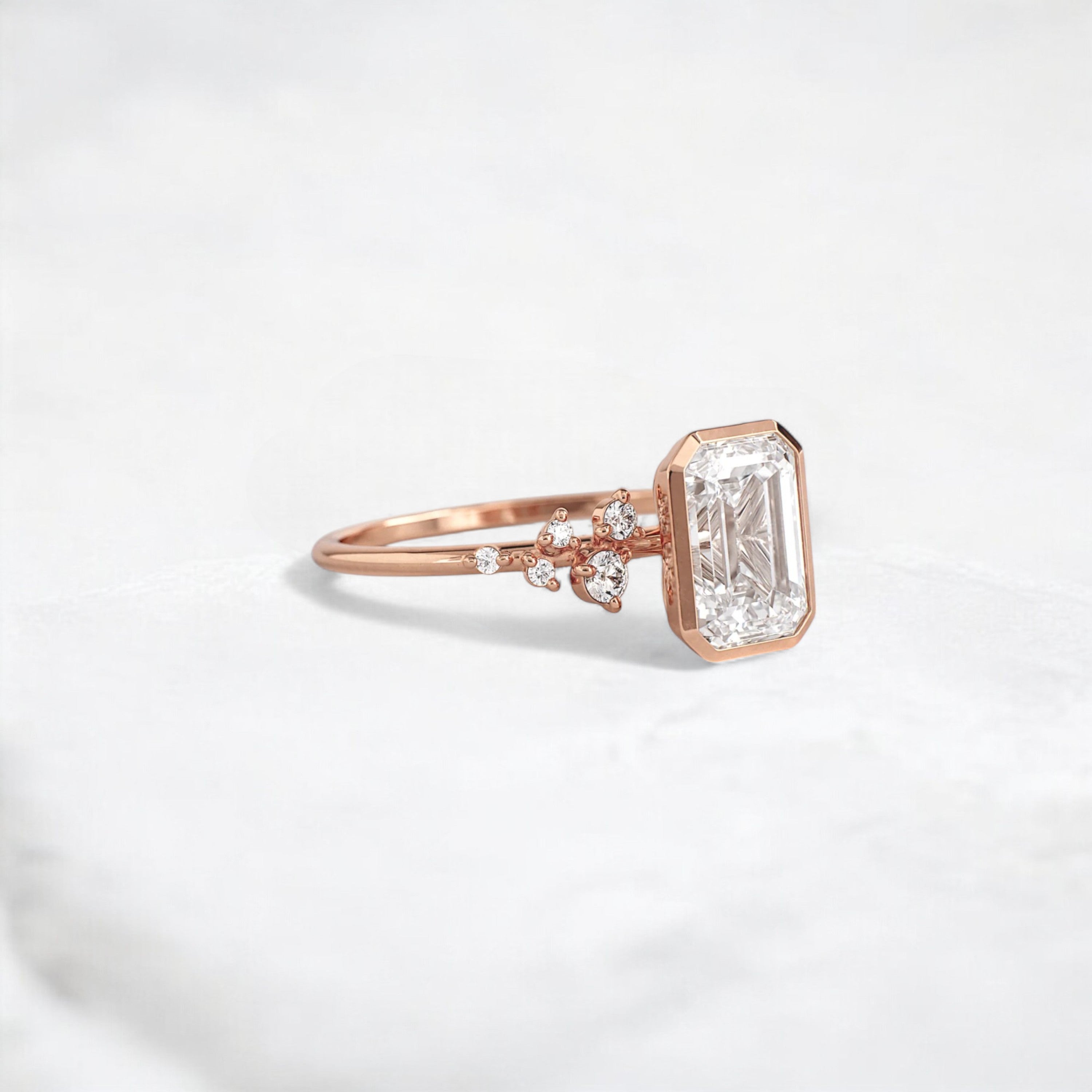 silent-luster-emerald-cluster-bezel-moissanite-engagement-ring-1-ct-rose-gold-gemfora-2