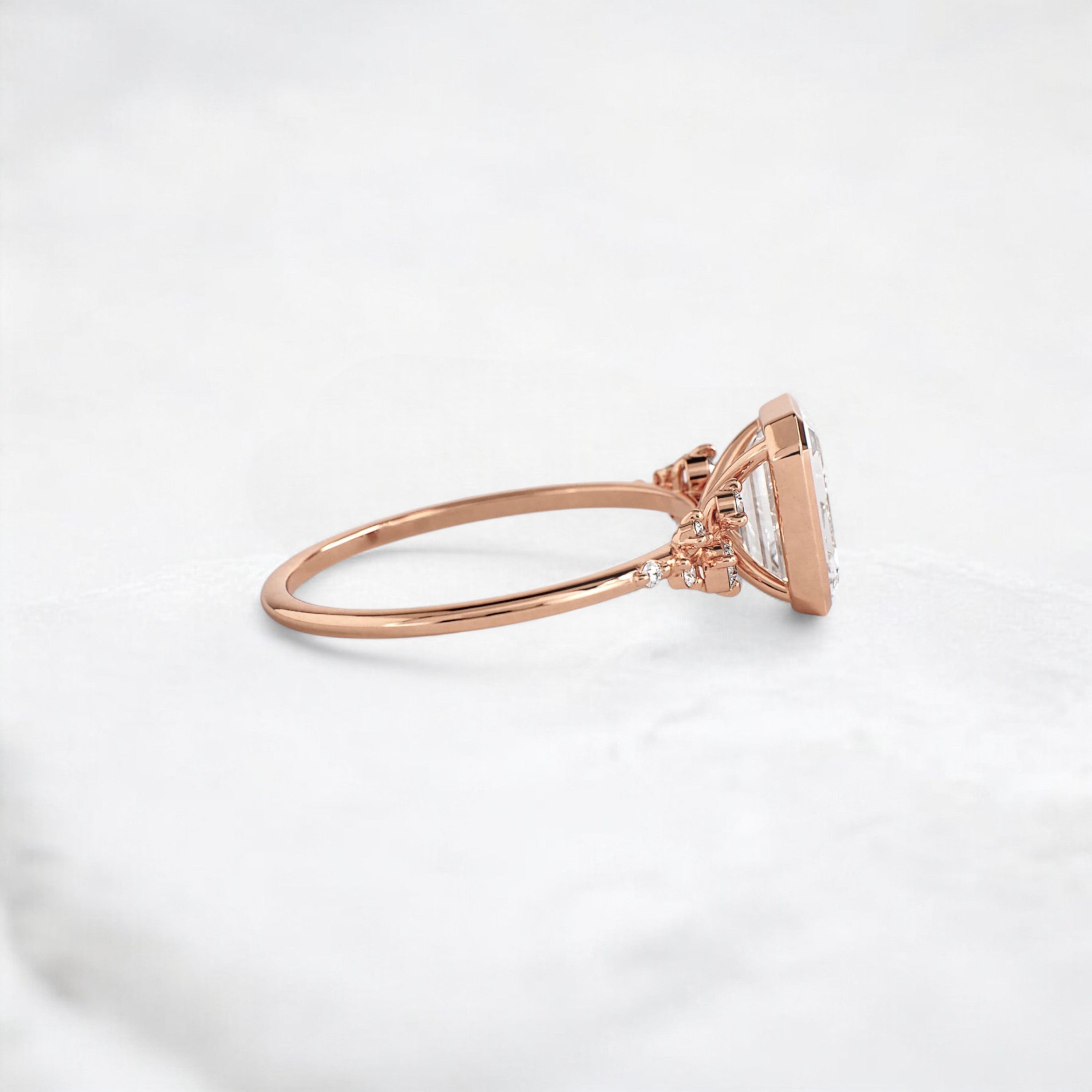 silent-luster-emerald-cluster-bezel-moissanite-engagement-ring-1-ct-rose-gold-gemfora-3