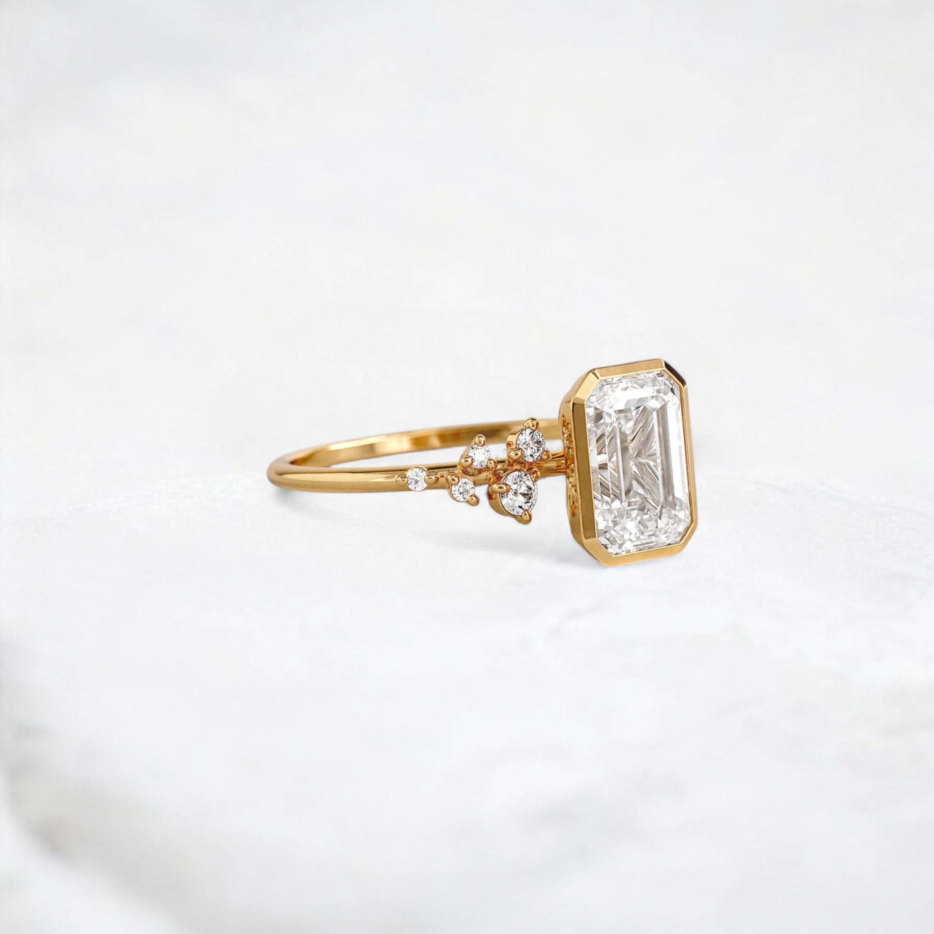 silent-luster-emerald-cluster-bezel-moissanite-engagement-ring-1-ct-yellow-gold-gemfora-2