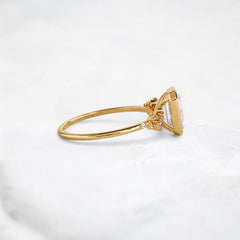 silent-luster-emerald-cluster-bezel-moissanite-engagement-ring-1-ct-yellow-gold-gemfora-3