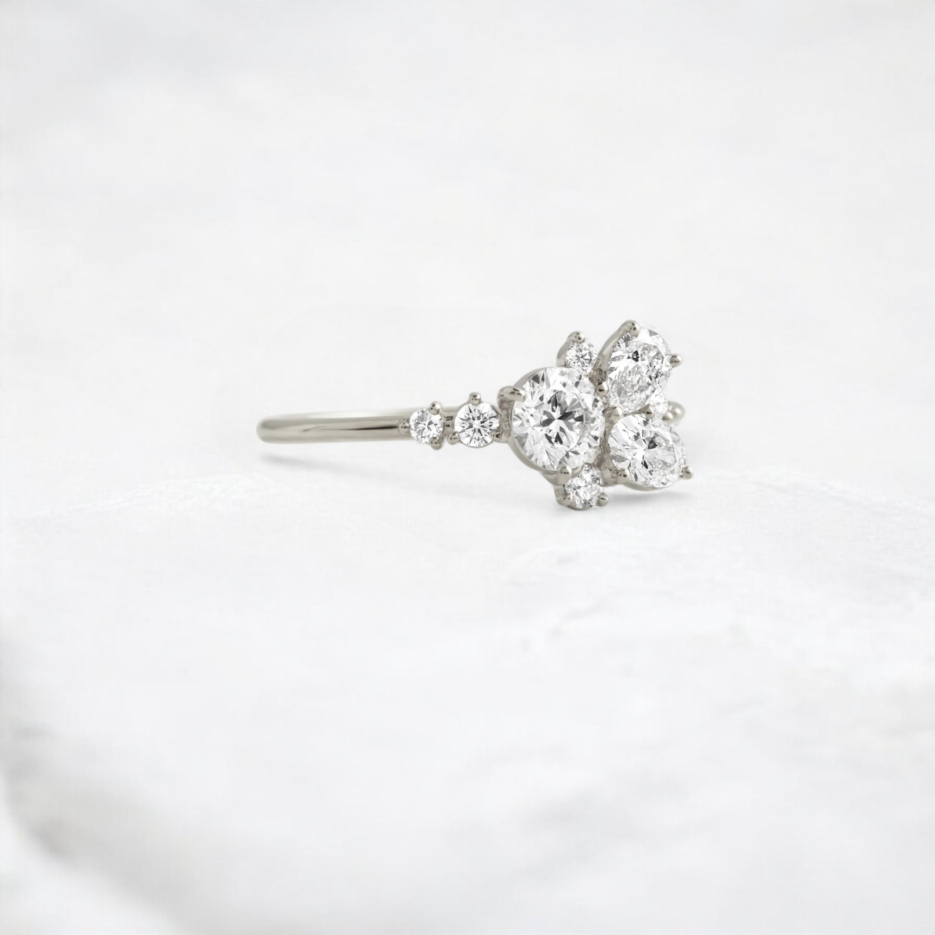 starpetal-whispers-round-cluster-love-engagement-ring-0-30-ct-platinum-gemfora-2