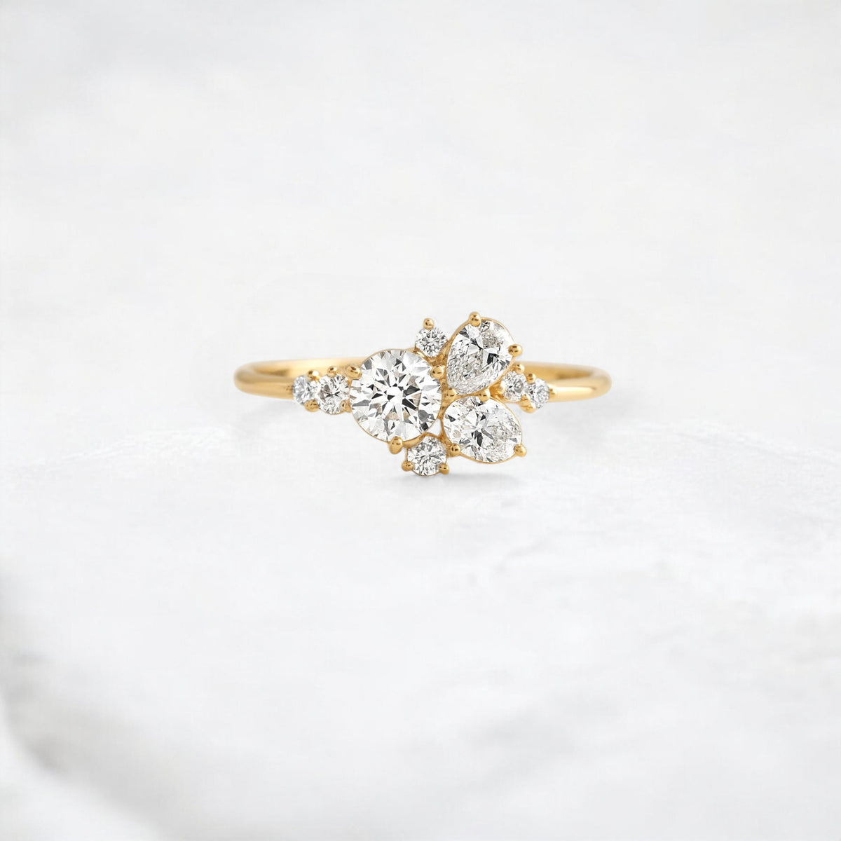 starpetal-whispers-round-cluster-love-engagement-ring-0-30-ct-yellow-gold-gemfora-1