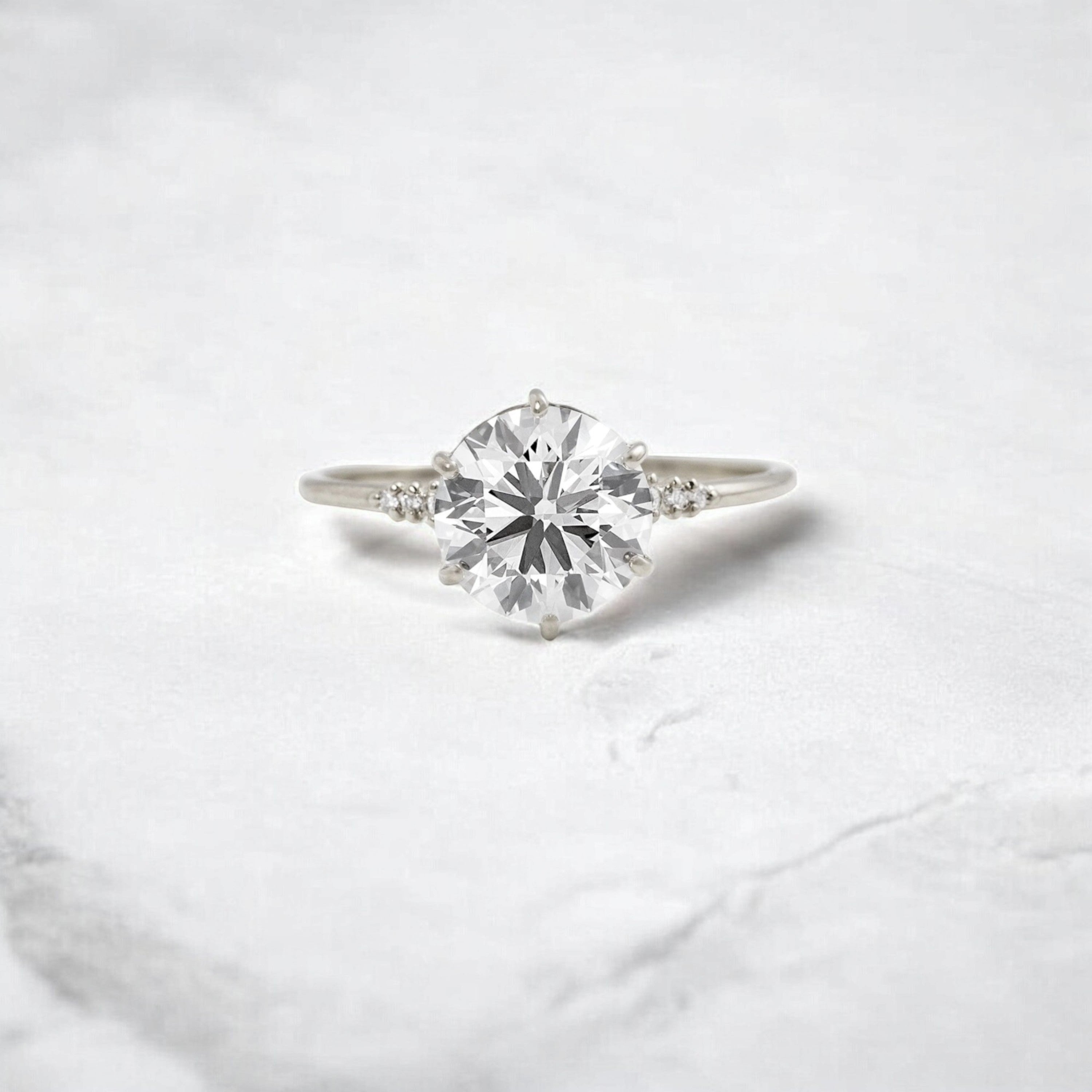 true-promise-round-moissanite-ring-in-classic-golden-glow-2-ct-platinum-gemfora-1