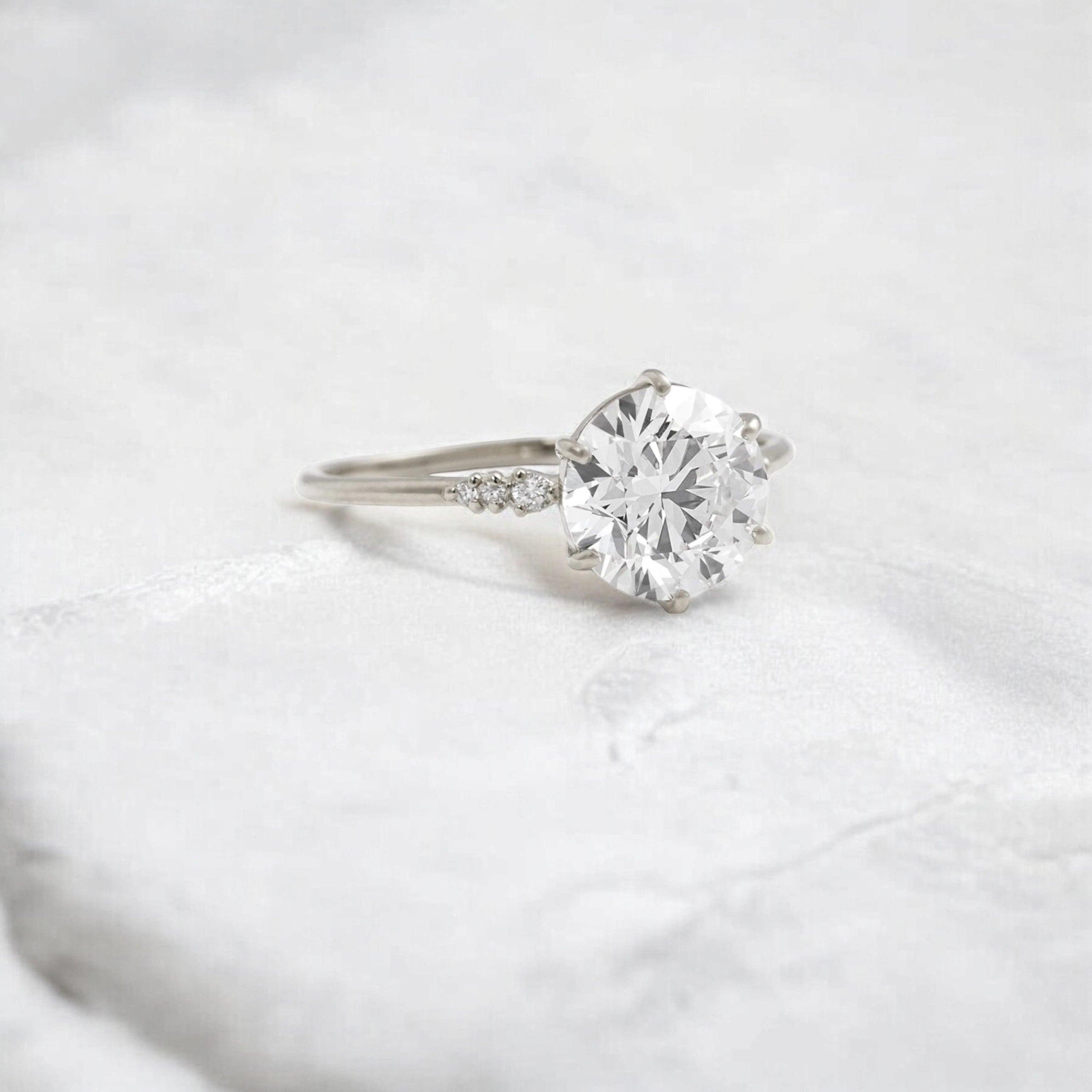 true-promise-round-moissanite-ring-in-classic-golden-glow-2-ct-platinum-gemfora-2