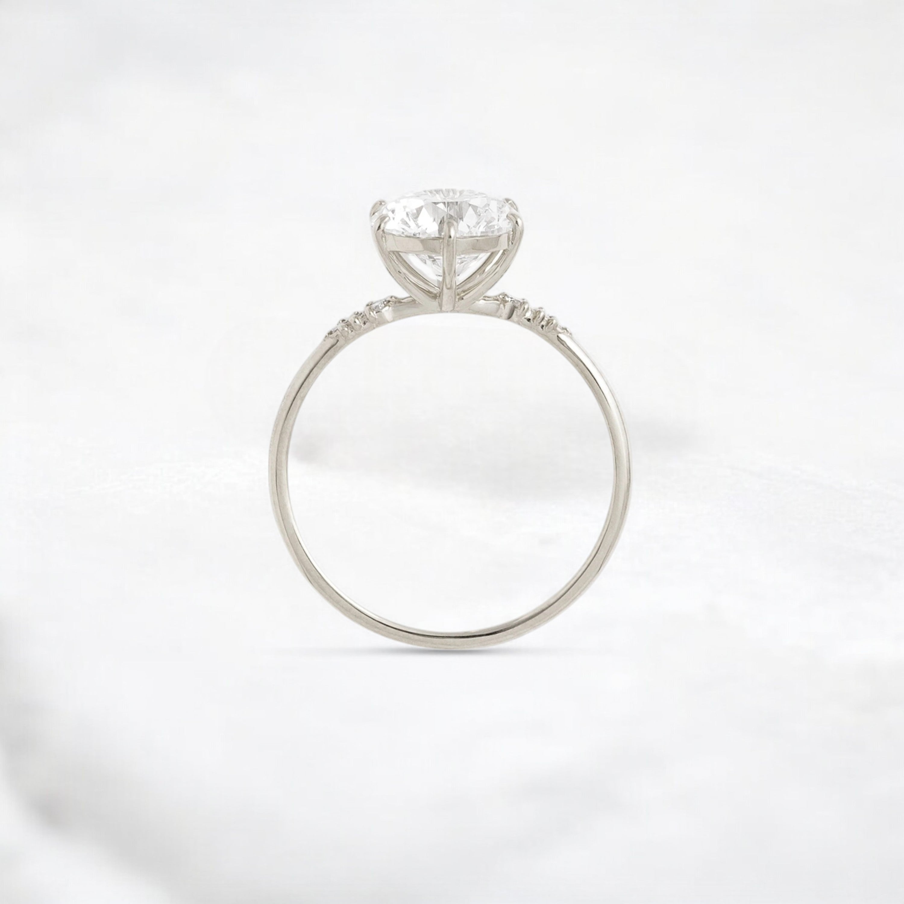 true-promise-round-moissanite-ring-in-classic-golden-glow-2-ct-platinum-gemfora-3
