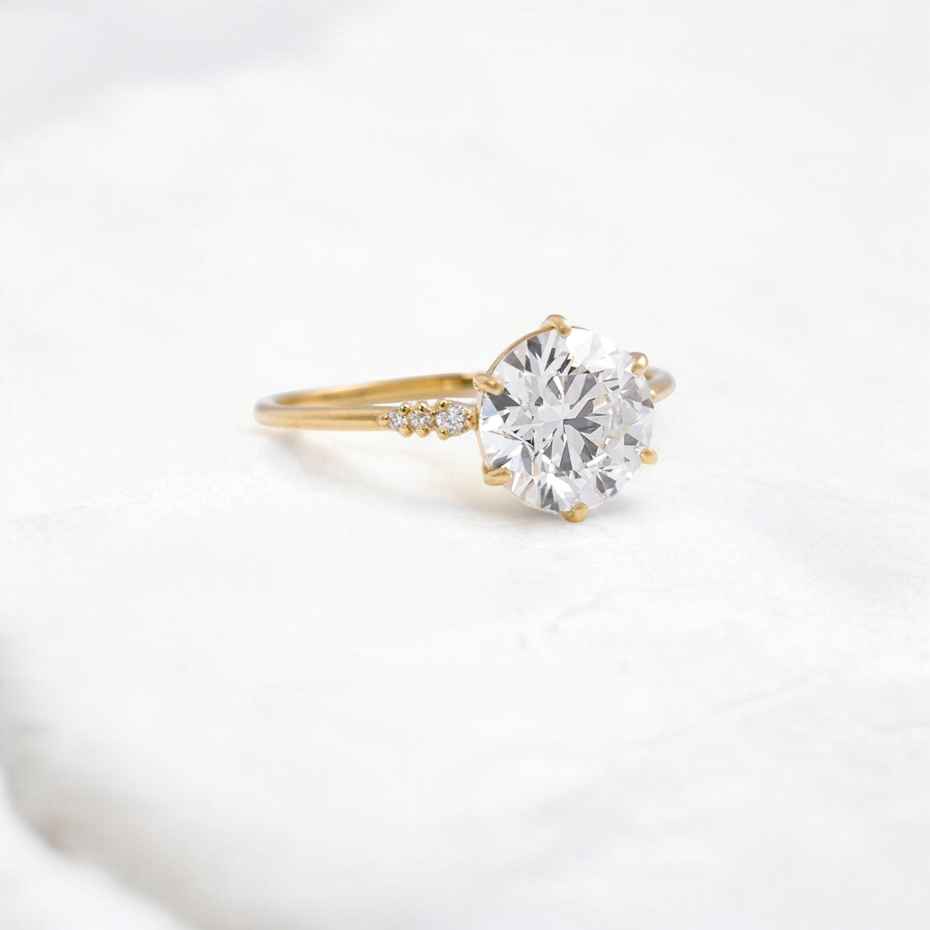 true-promise-round-moissanite-ring-in-classic-golden-glow-2-ct-yellow-gold-gemfora-2