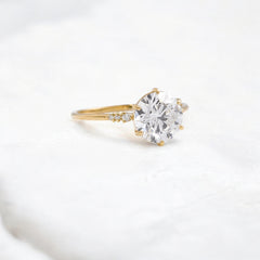 true-promise-round-moissanite-ring-in-classic-golden-glow-2-ct-yellow-gold-gemfora-2
