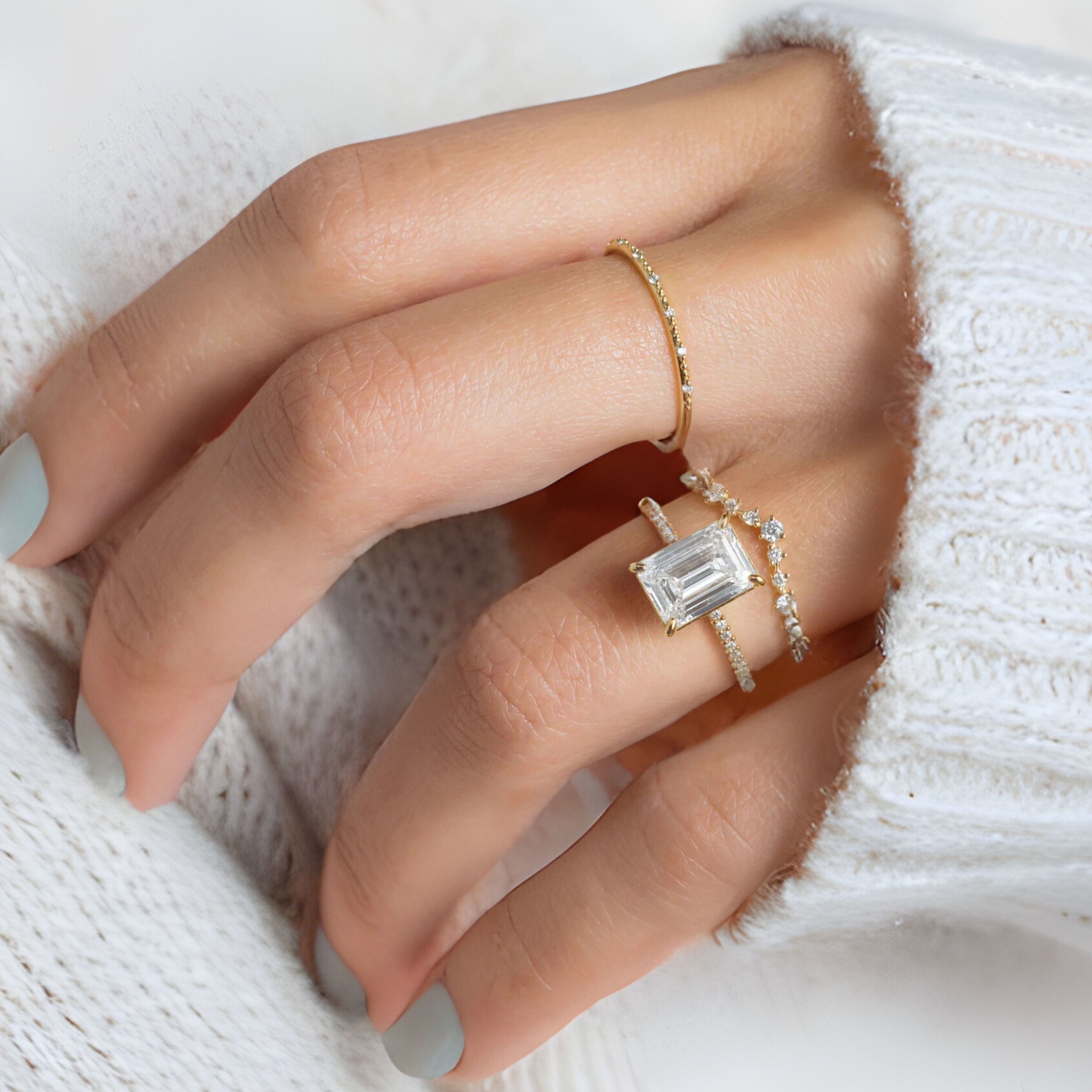 whispers-of-eternity-emerald-pave-diamond-engagement-ring-model-gemfora